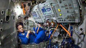 astronaut inside of a spaceship