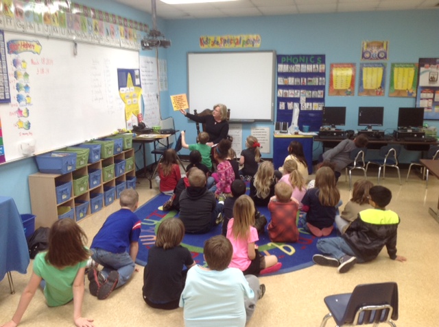 gnc teacher and group in classroom.JPG