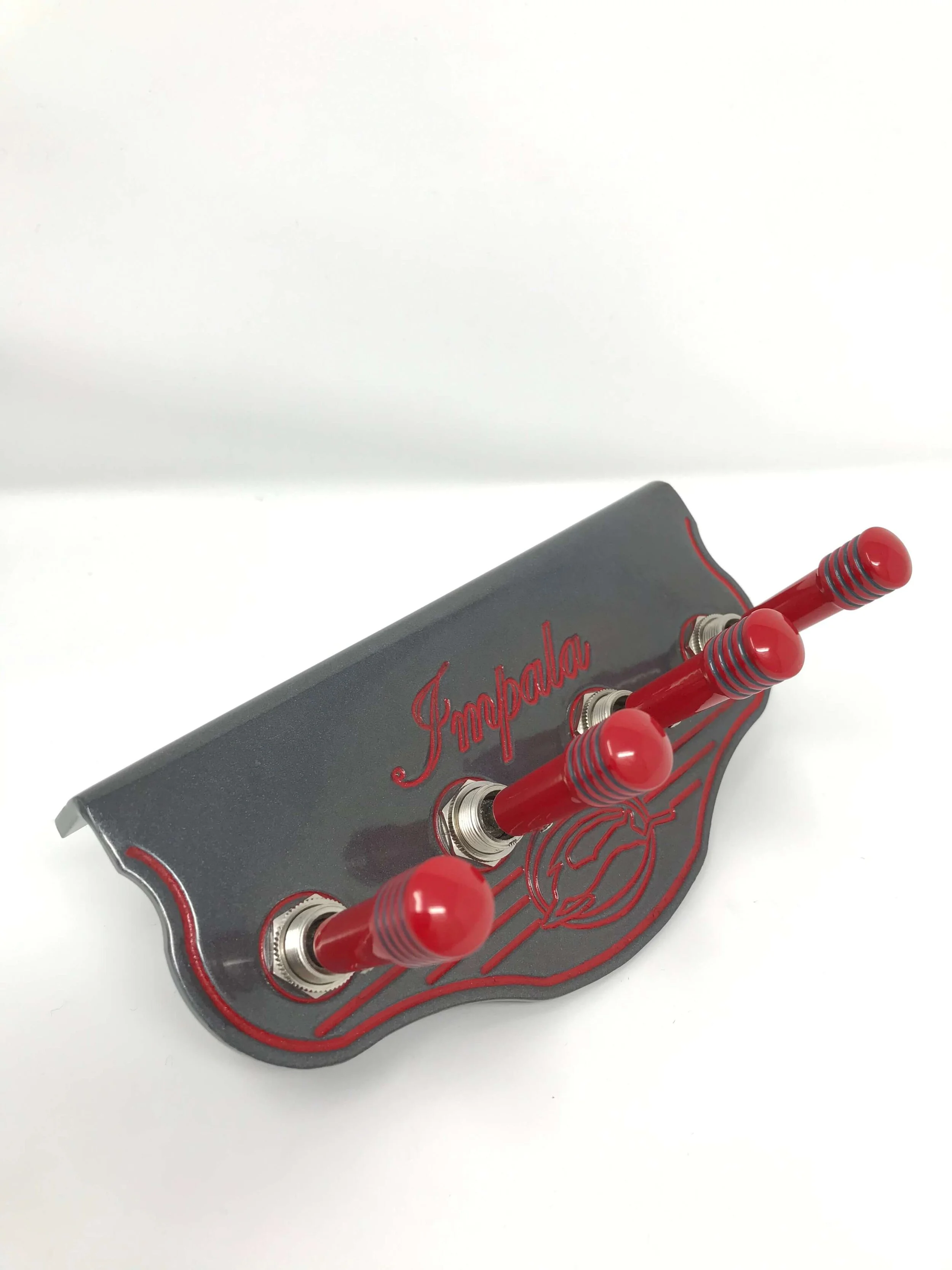 Hydraulic Switch Panel Plates Impala with Red Custom FAMS Toggle Switch Extensions  famswitches.JPG