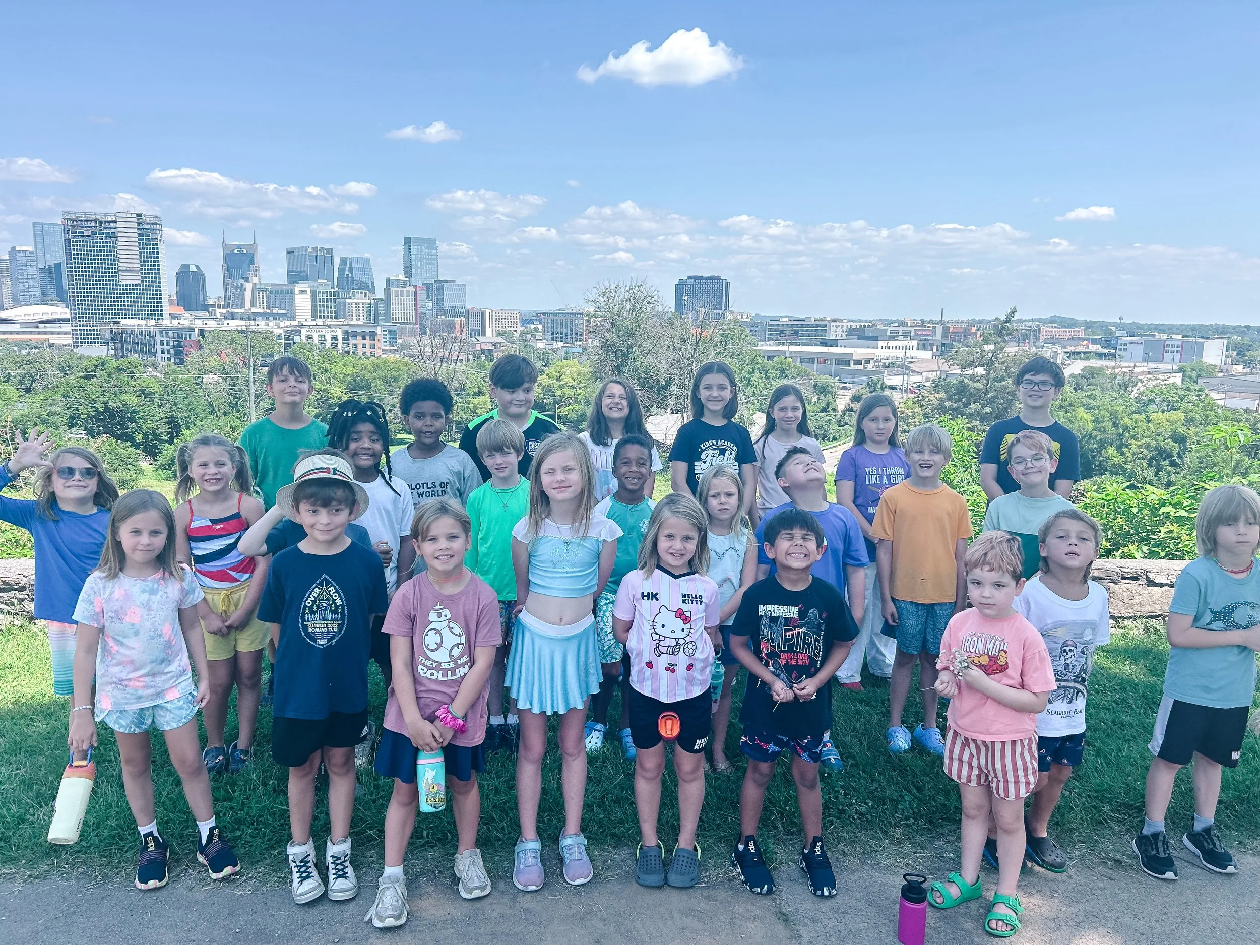 Group of children smiling at Adonai Arts Academy summer camp in Nashville, TN