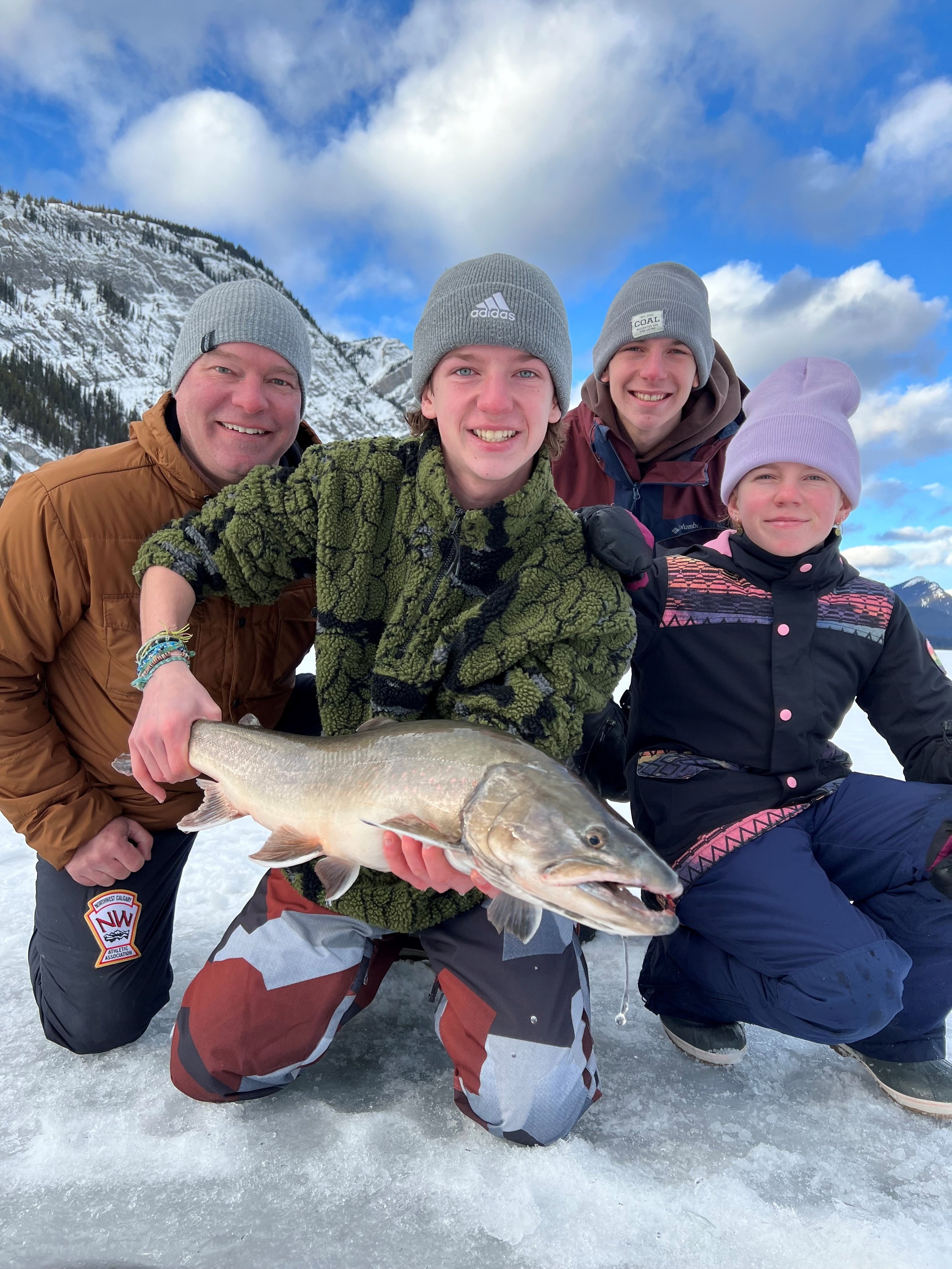 Ice Fishing — Canmore Fishing Adventures – boat trips on the Bow