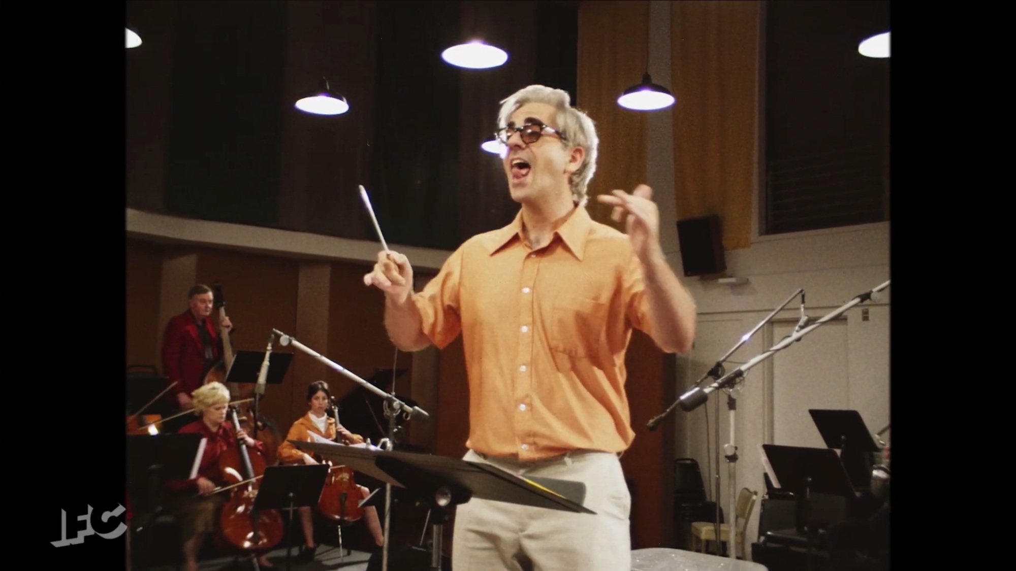 Conducting onscreen in IFC’s Documentary Now ( Original Cast Album: Co-op )