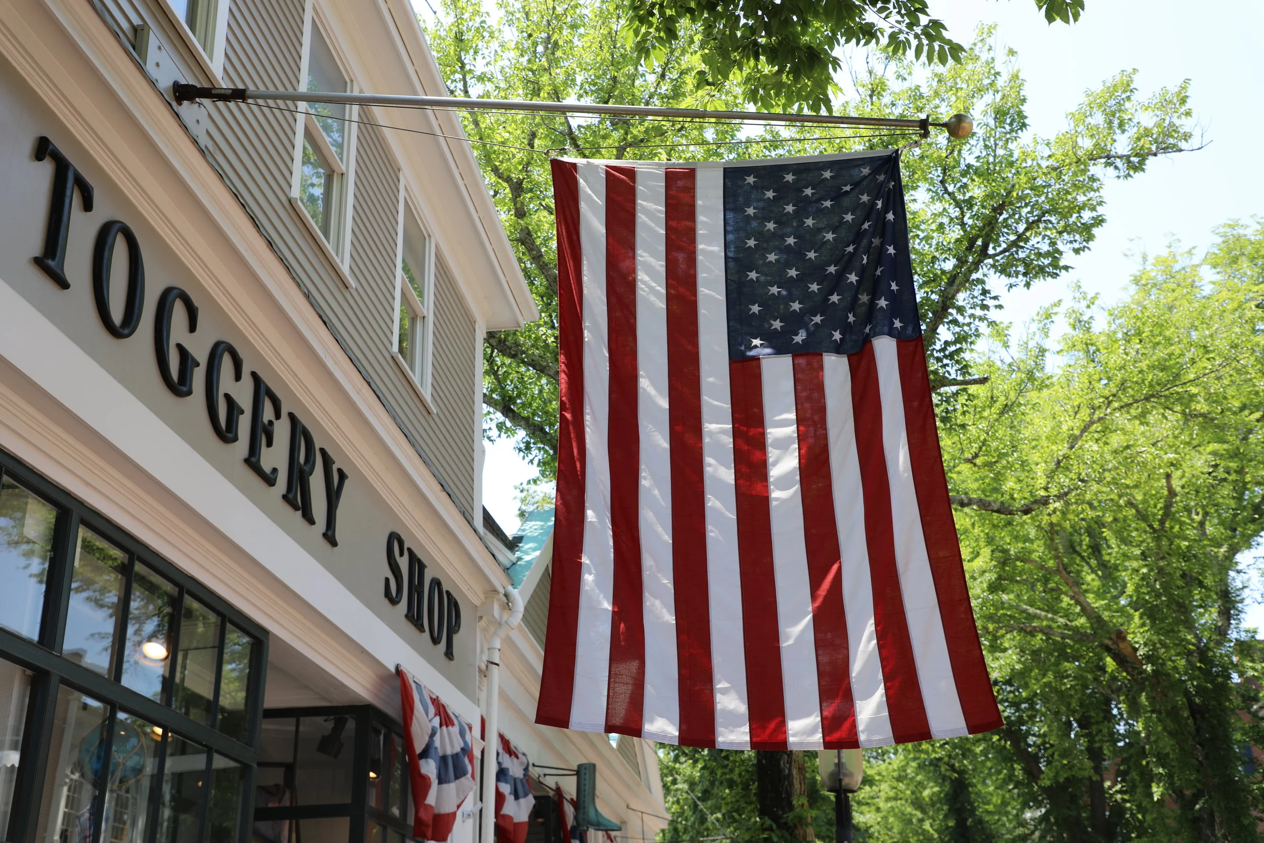 In town festivities. Let the celebration begin!!! The American Flag at Murray’s. Main Street. ©betsygibsondesign