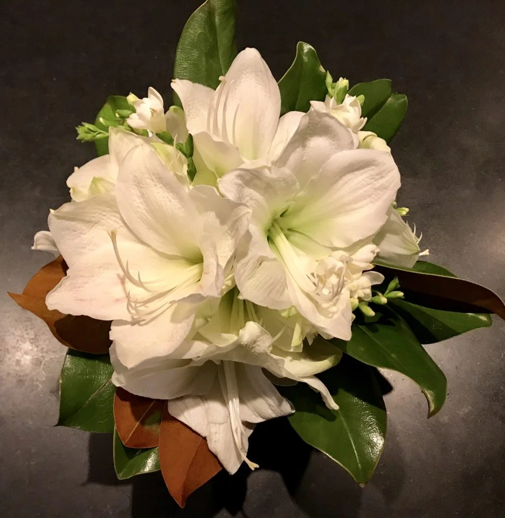White Amaryllis, Magnolia and Freesia. ©betsygibsondesign
