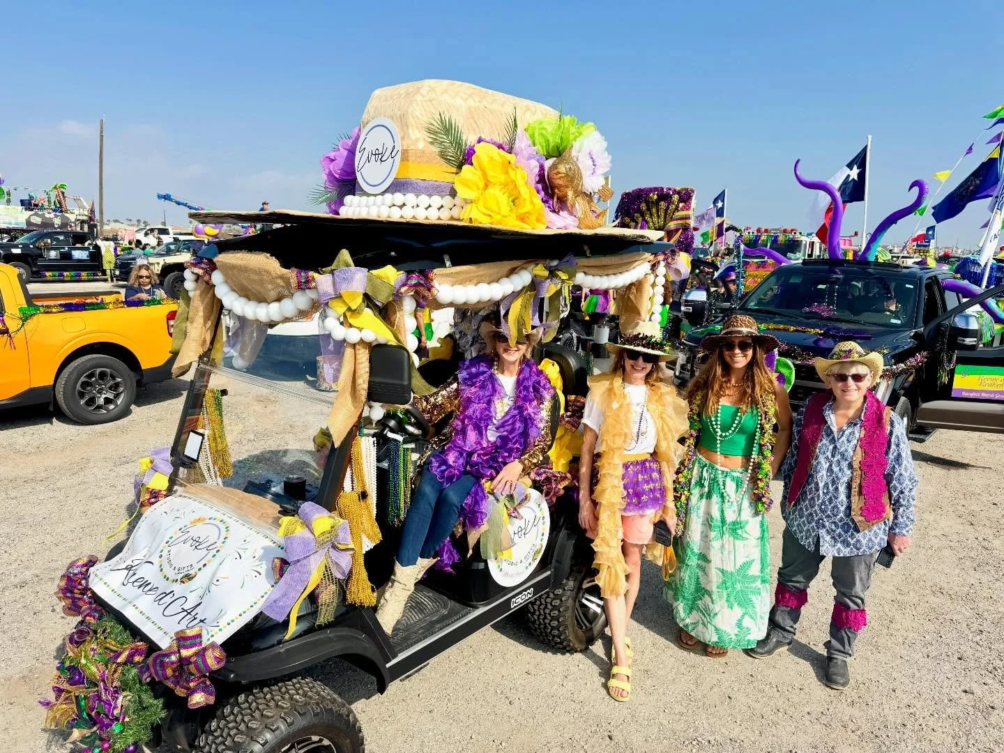 See ya on the beach during the @barefootmardigras in the @evokebymelissa cart! We made a giant hat! 🎩 &amp; you can decorate your hat, shop art, and grab all the gifts you need at Evoke Studio on #padreisland! 💜💛💚
.
#barefootmardigras #mardigras 