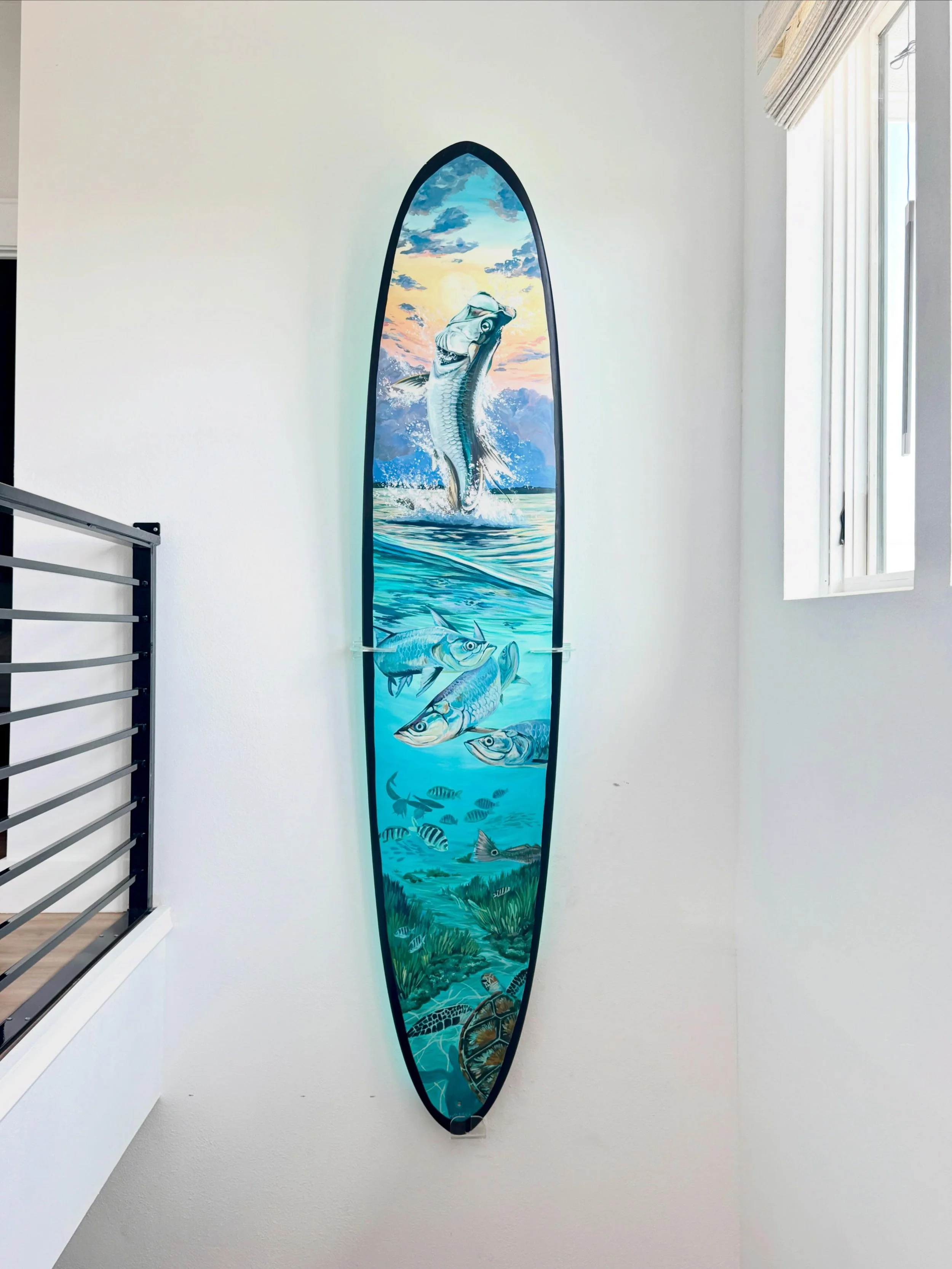 &ldquo;Tarpon Tank&rdquo;, acrylic on a 9&rsquo;0. Snapped some shots &amp; video of it hung in its new #portaransas beach home! Still obsessed. Thank you all for the lovely words on the previous post! Can&rsquo;t wait to paint more sea life!!! I&rsq
