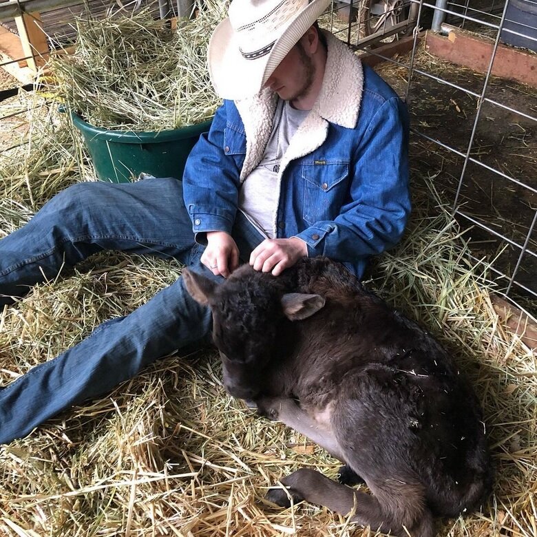 farmer and calf.jpg