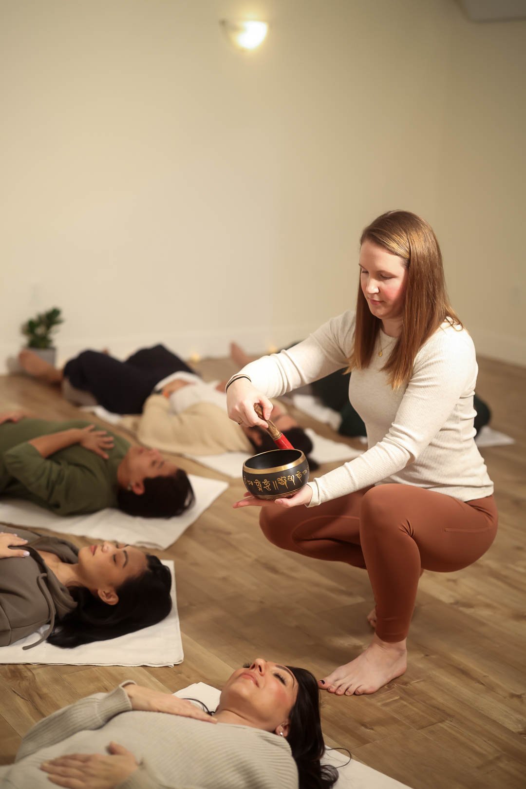 A calm yoga session on a mat, highlighting the Flex-8 membership for twice-a-week practitioners in Coquitlam.