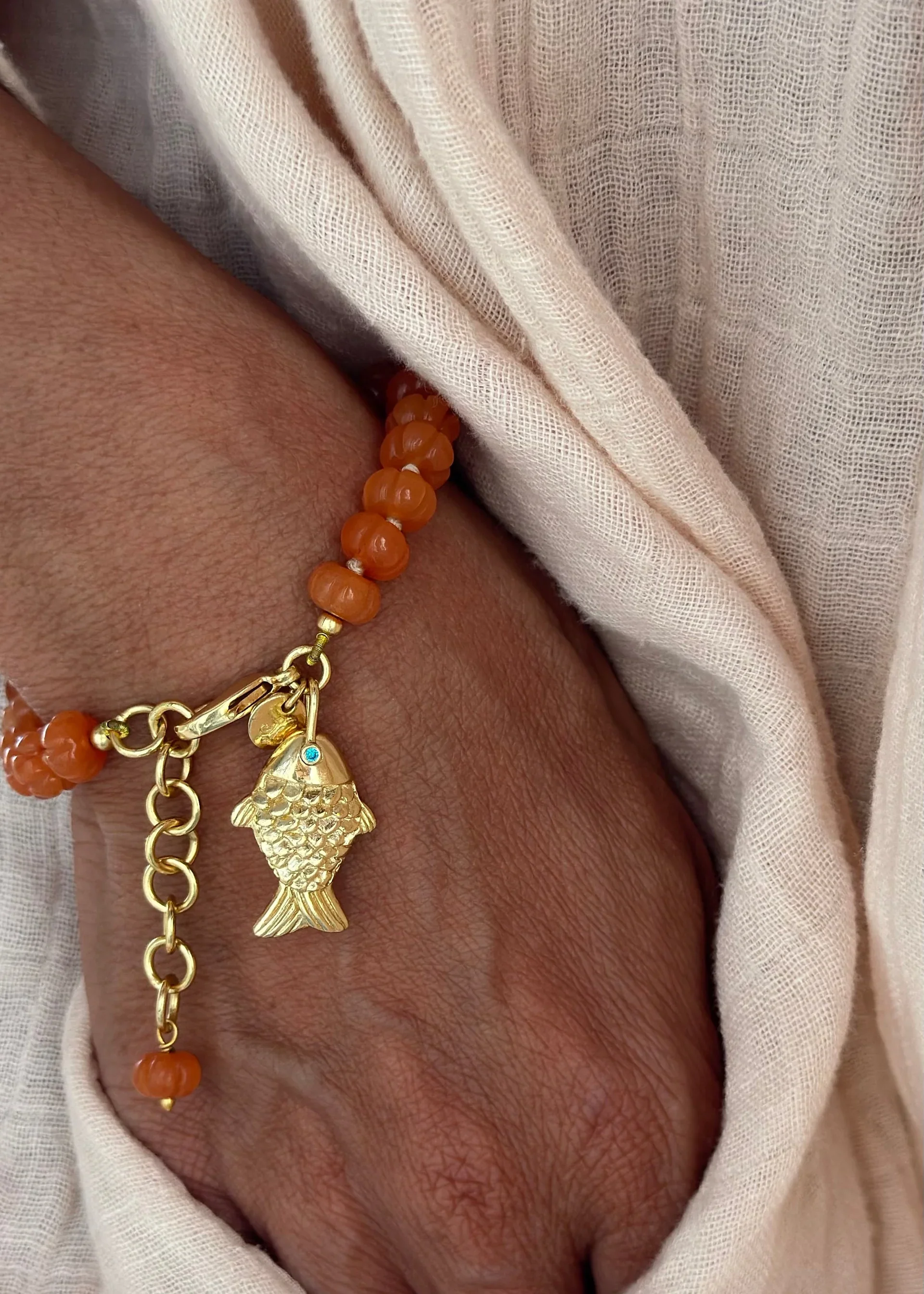Sara Lashay Raani bracelet orange on model