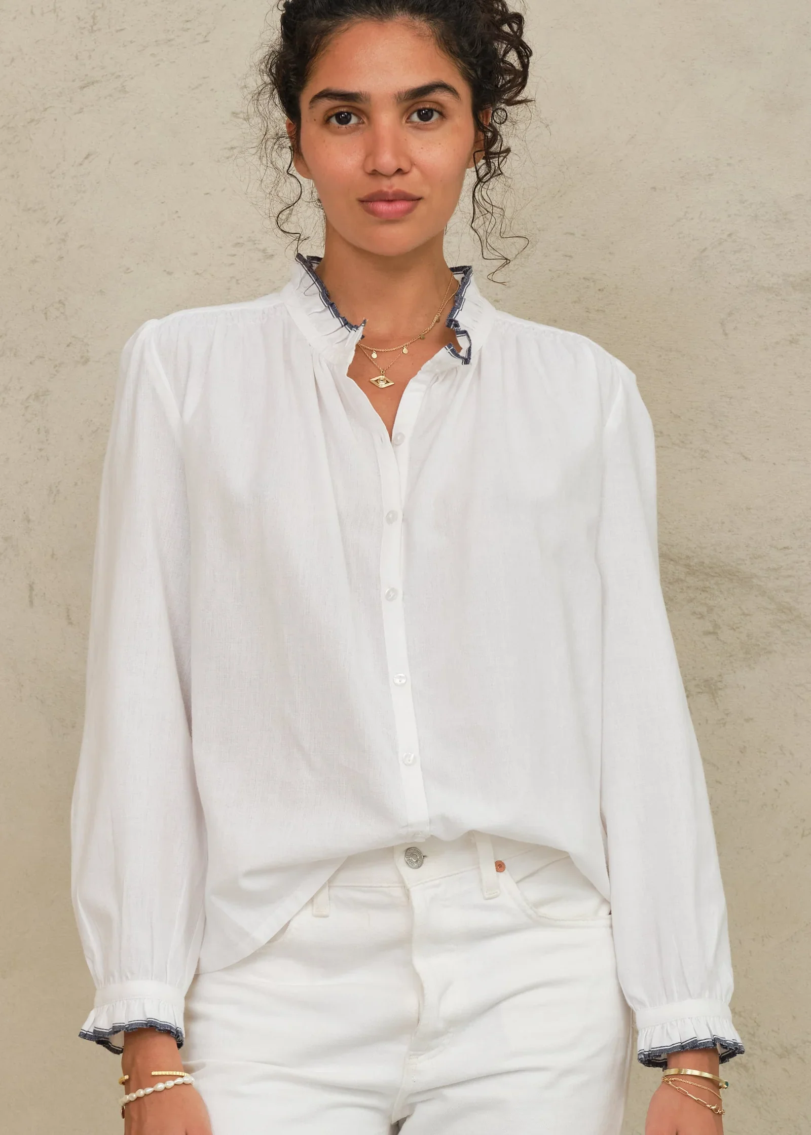 M.A.B.E Apparel ivory blouse front on model