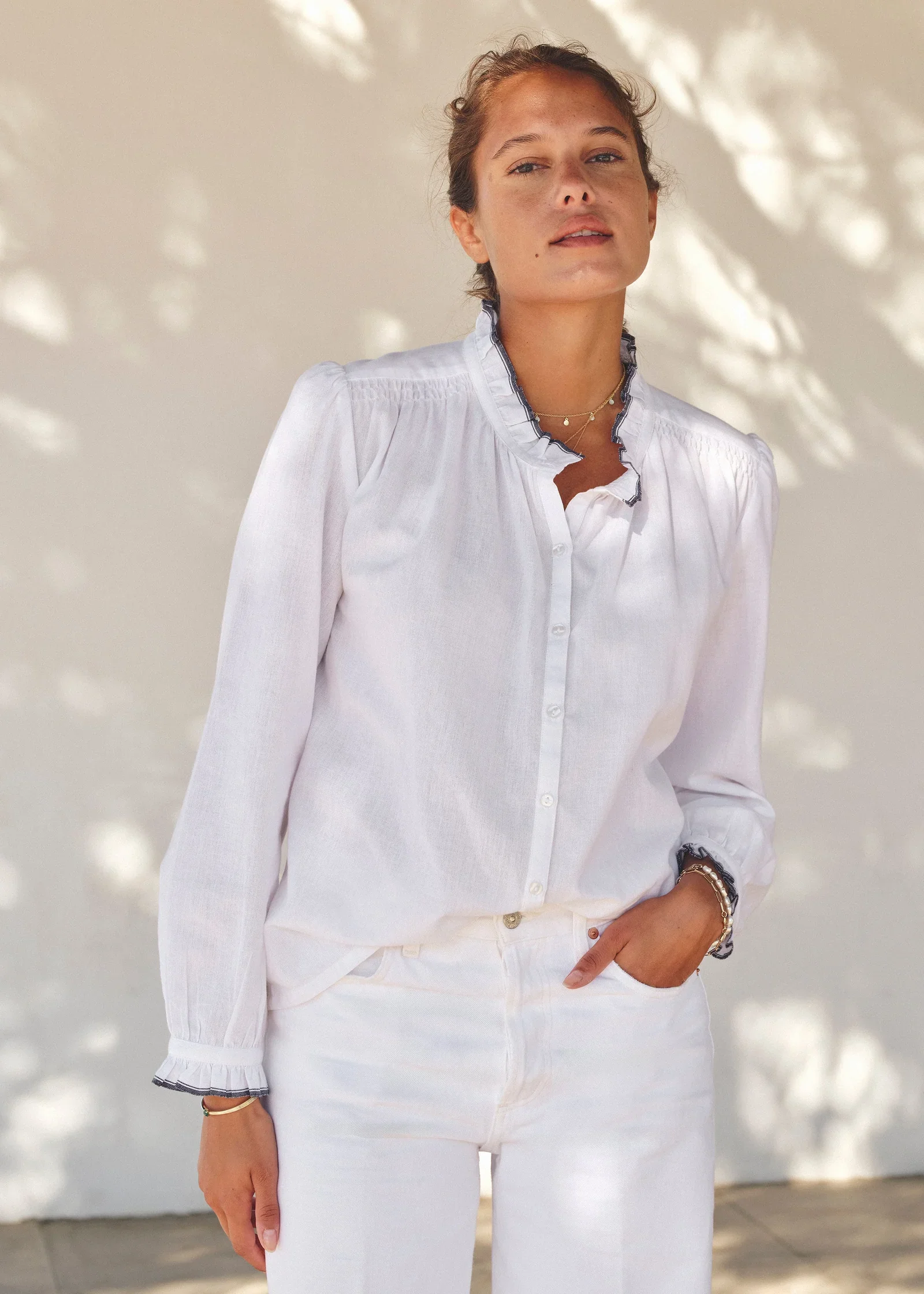 M.A.B.E Apparel ivory blouse campaign shot on model