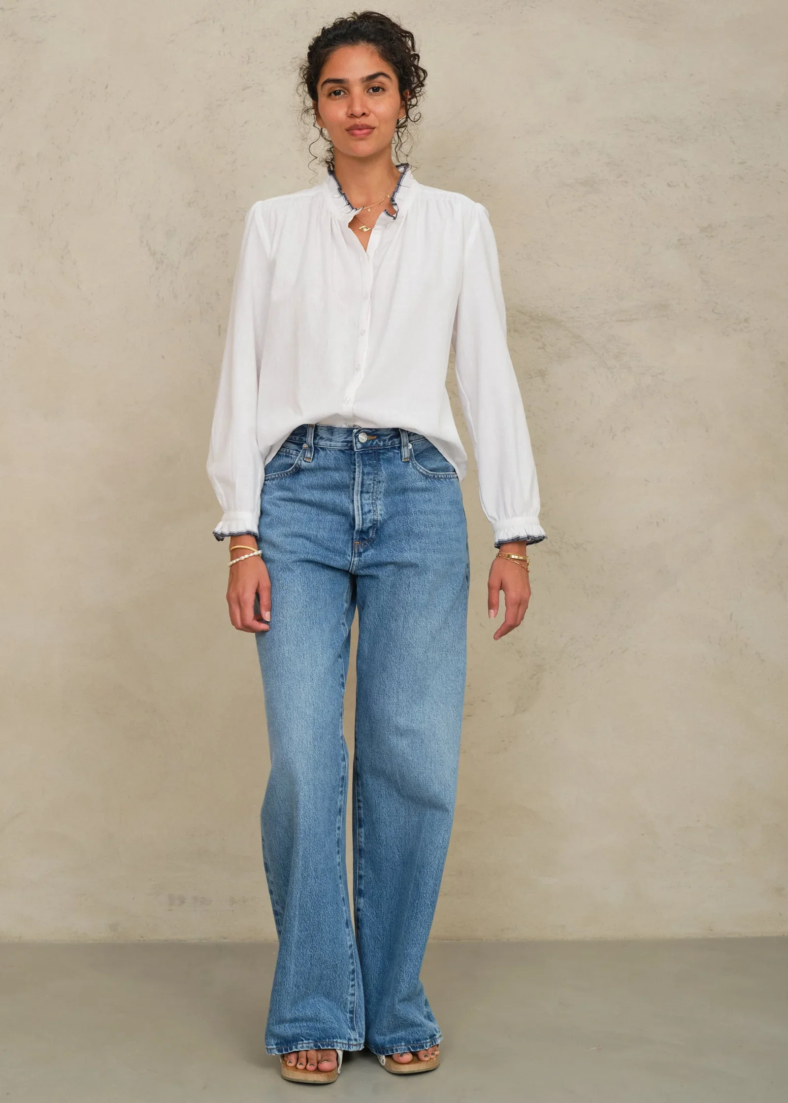 M.A.B.E Apparel ivory blouse front view on model