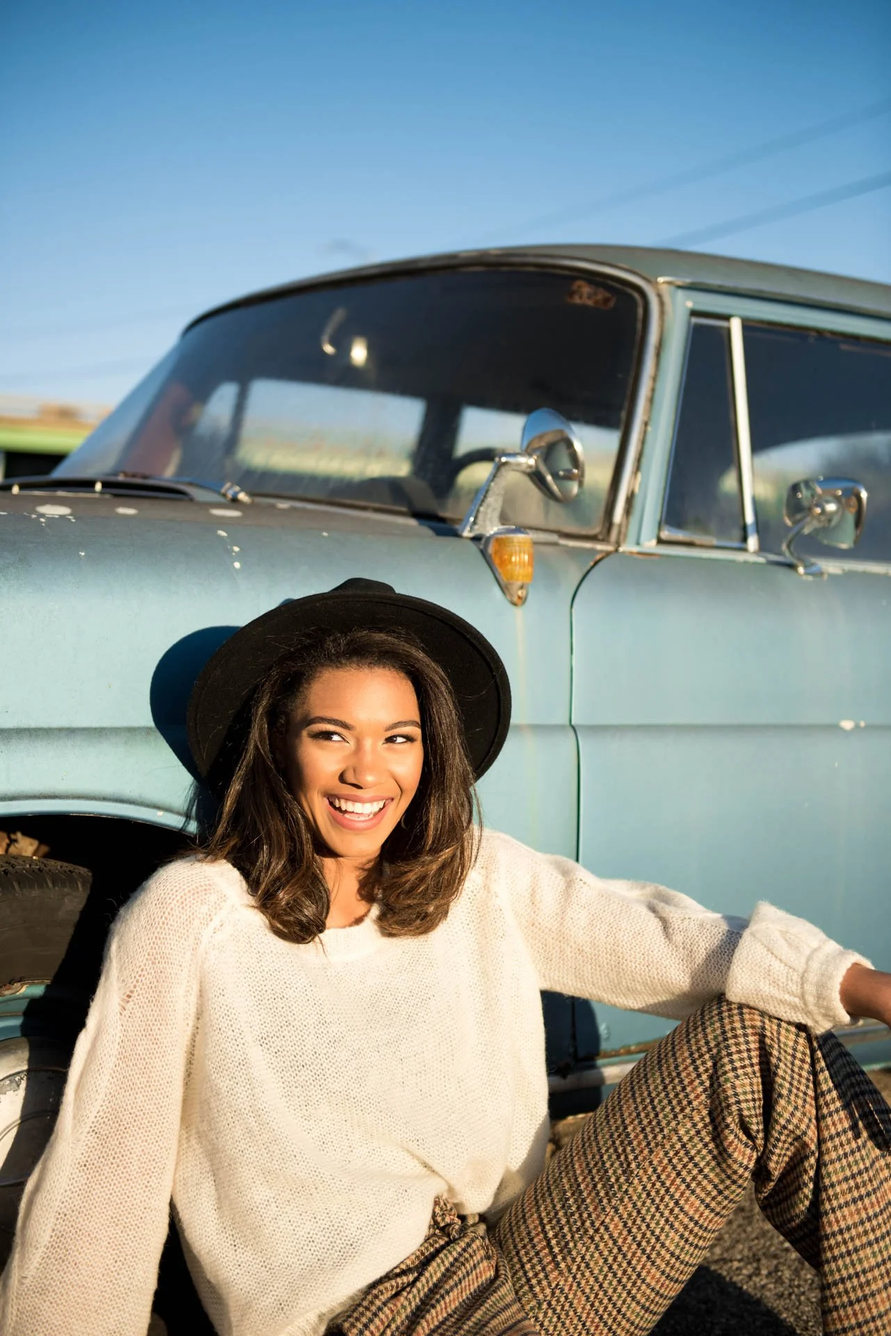 pell city high school senior photo session in fall with plaid pants as the sun sets