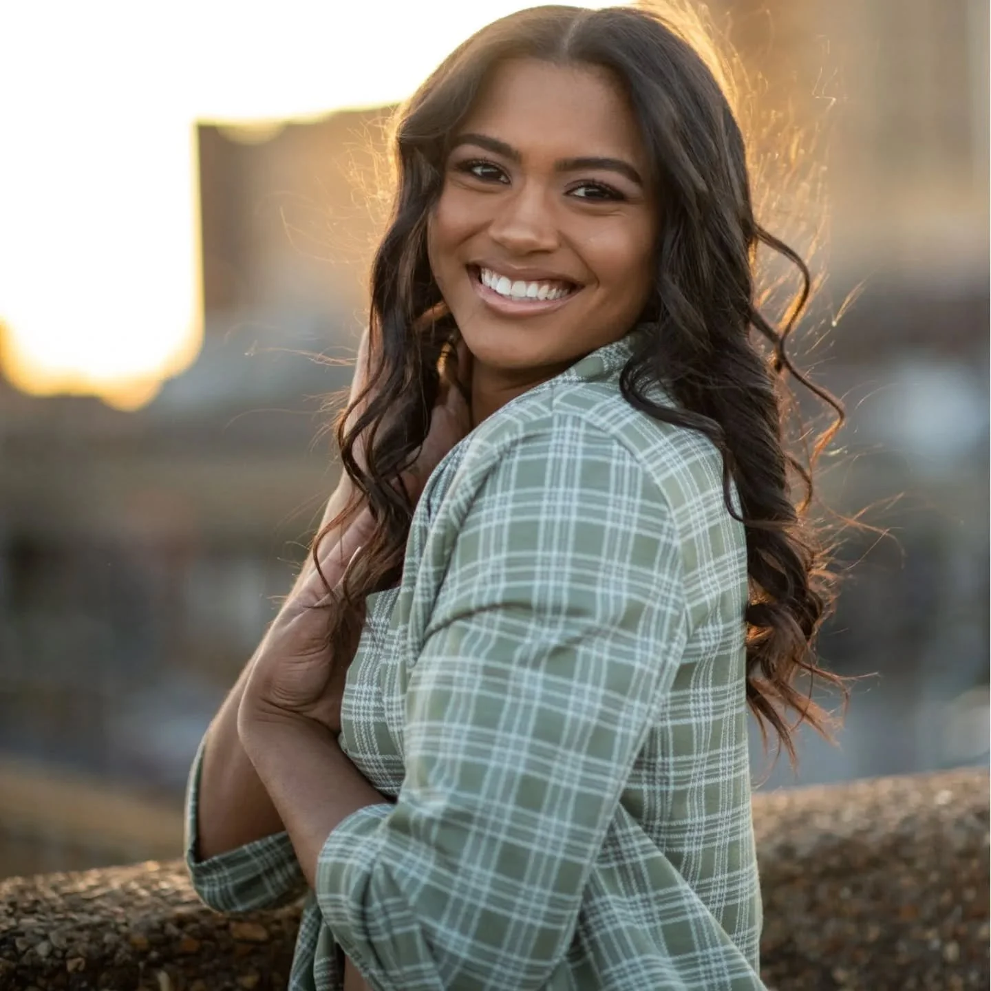 Meet Grace. 🤍 Downtown Birmingham, golden hour, and a girl who came with a vision. We went from neon orange and a 60s swirl skirt to a full plaid suit to the softest white dress against a blue wall &mdash; and she owned every single one. I genuinely
