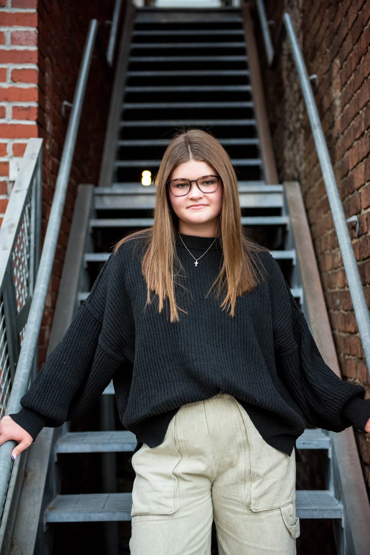 Senior girl on industrial stairs in Birmingham Alabama alley, Darling Dear Photo