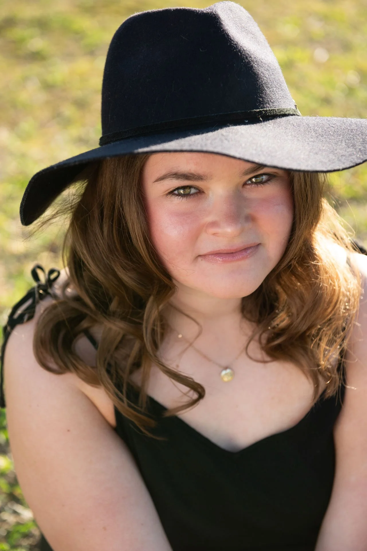 Senior portrait close up with floppy hat in Alabama field, Darling Dear Photo