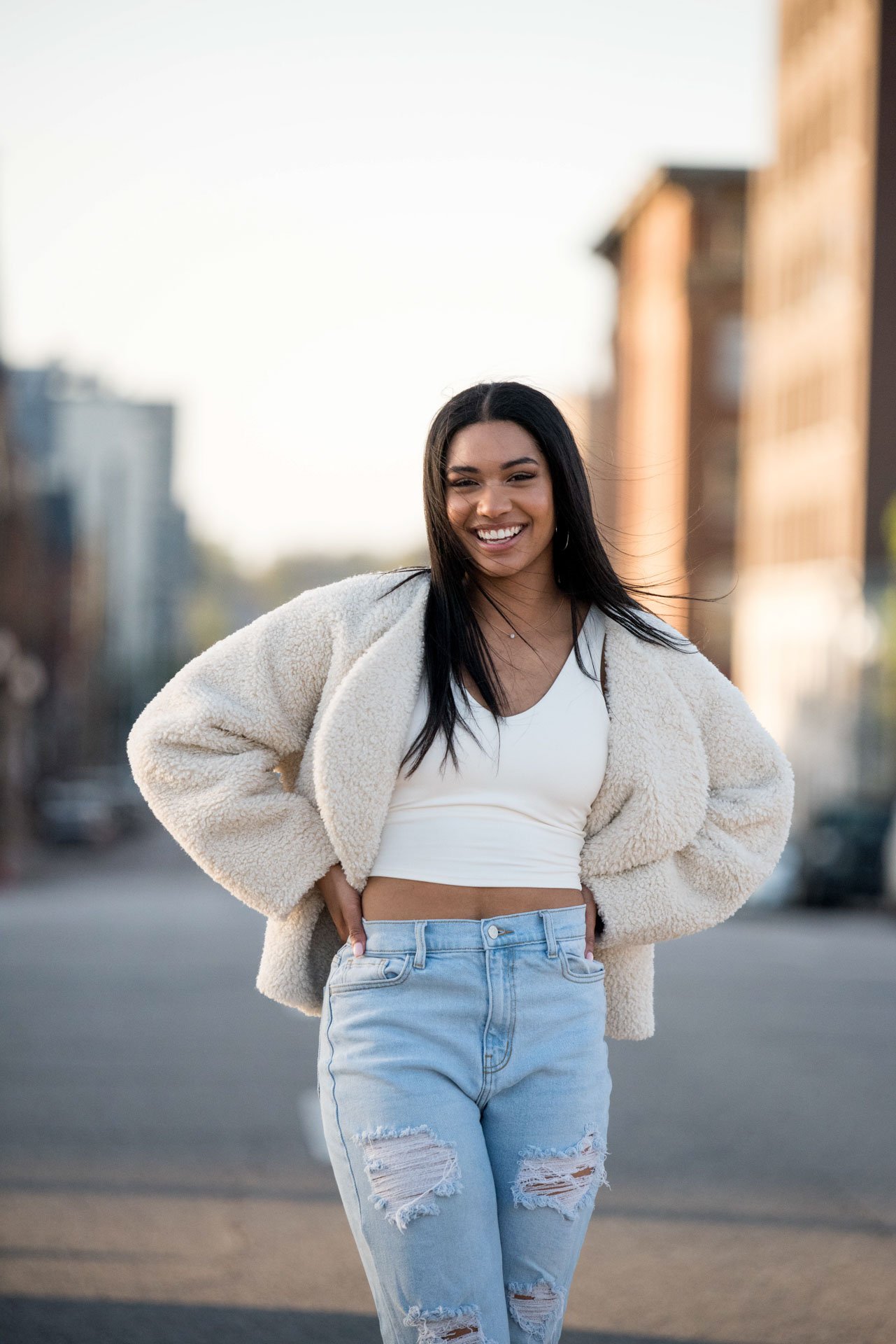 College graduation portrait of Brooke laughing on a Birmingham Alabama street, Darling Dear Photo