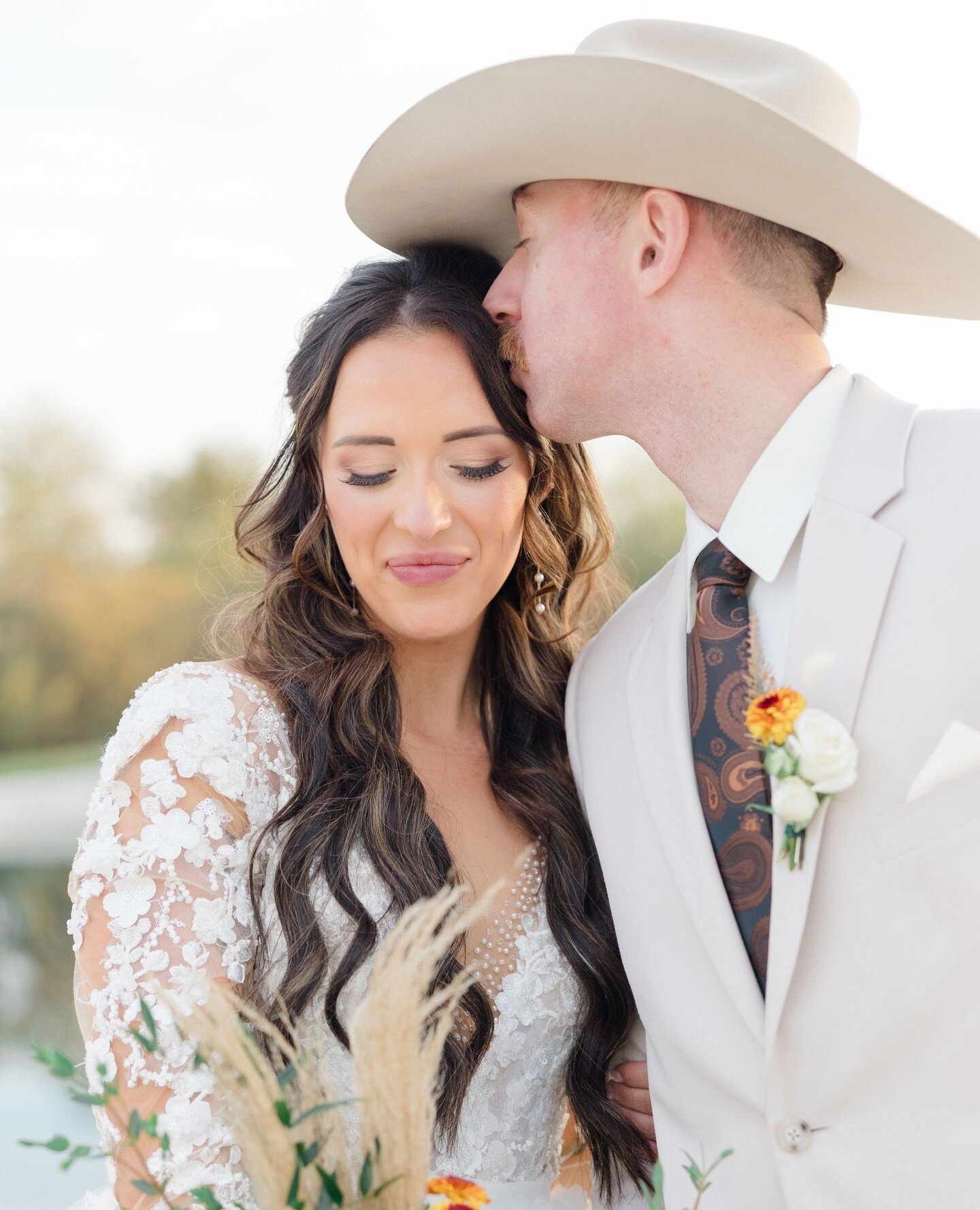 Giddy up, lovebirds! 🤠💋 Wrangling hearts and stealing kisses, this cowboy and his bride are ready to ride off into the sunset together! 🌅💕 ⁠