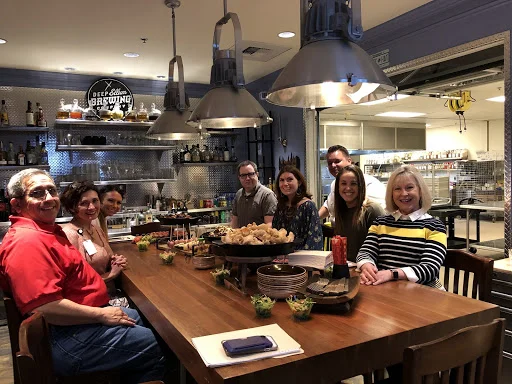 group around table at a brewery.jpg