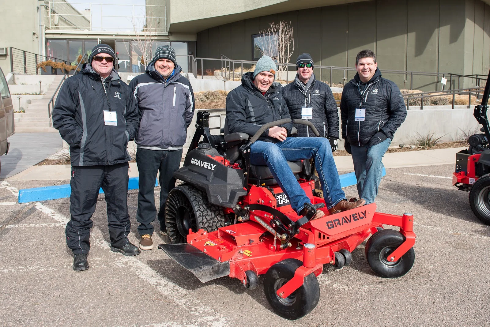 Grow2019 men near riding mower.jpg