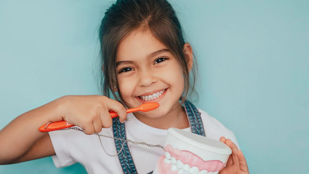 When should I start taking my kids to the dentist?