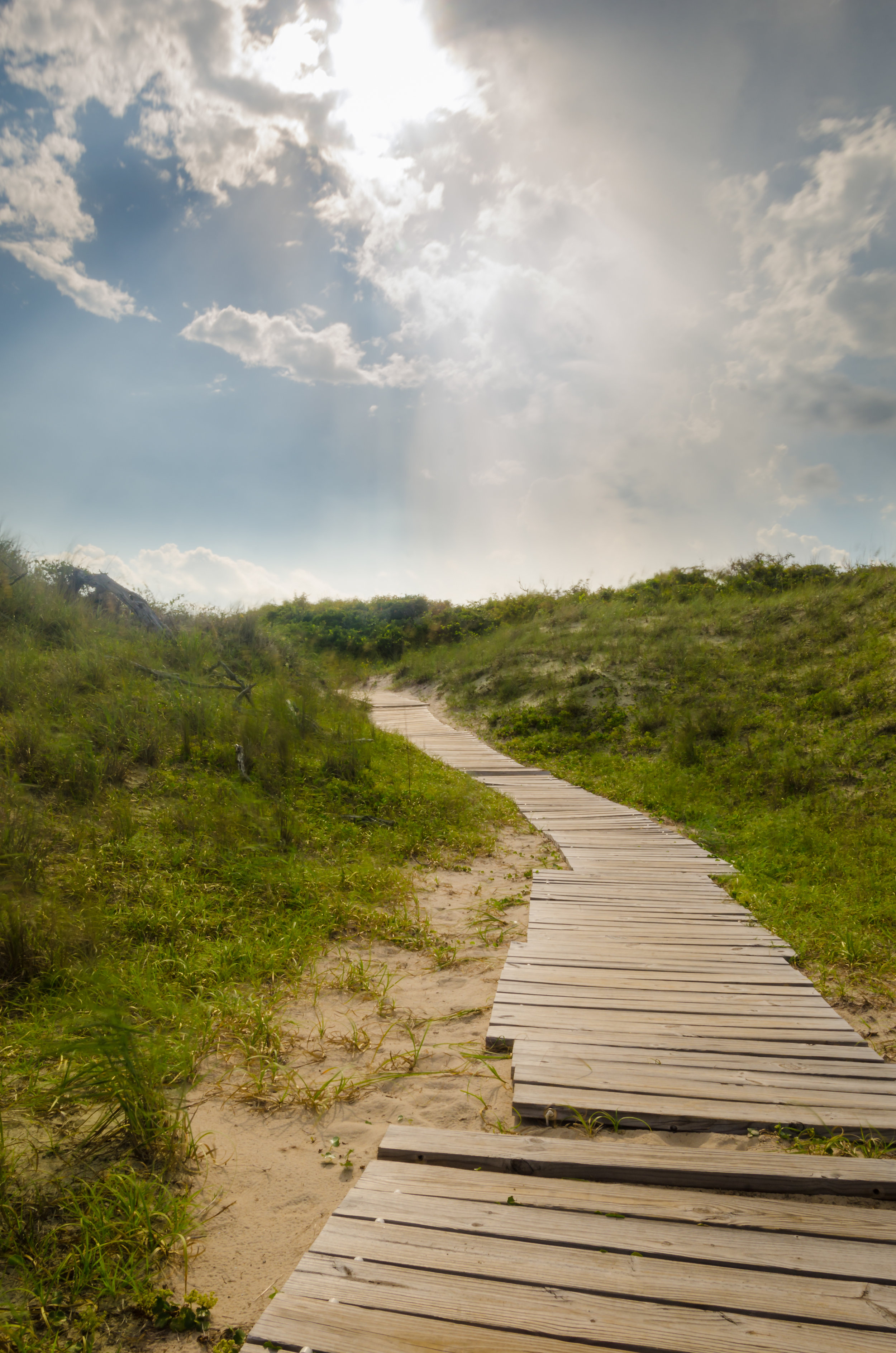 Heaven rays shine down upon a beach path in Virginia Beach, Virginia.jpg