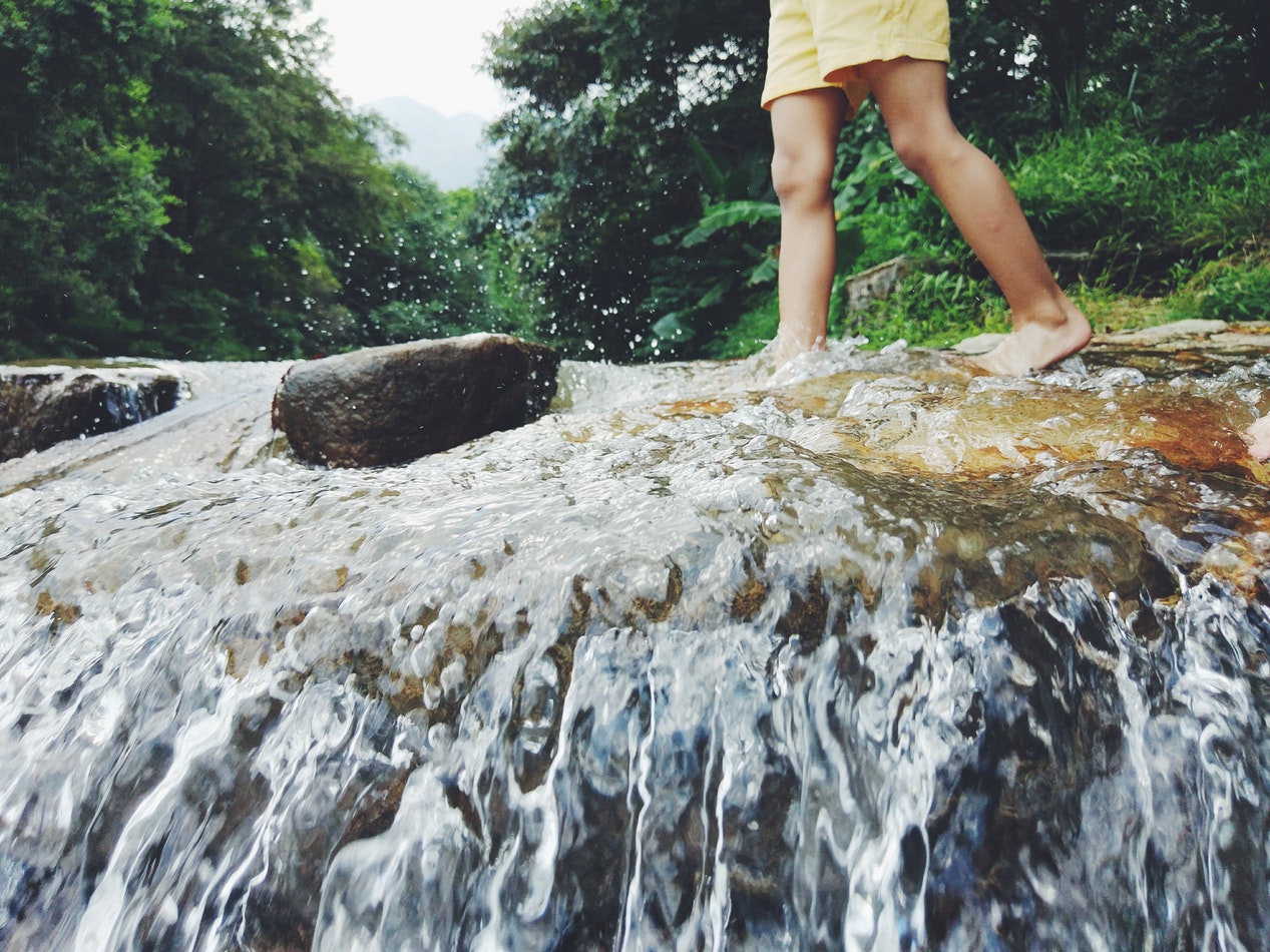 kid in river.jpeg