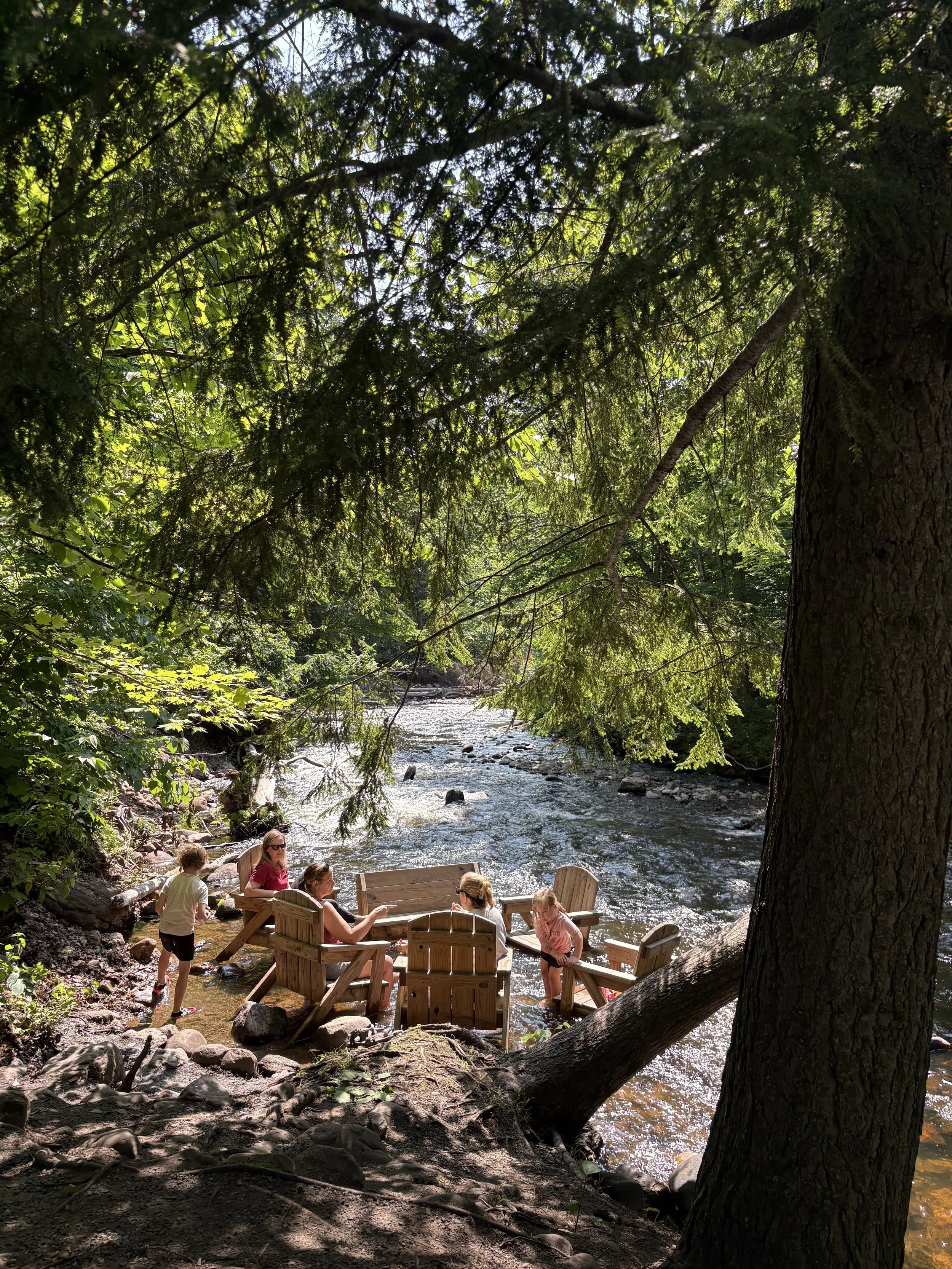 Summer riverfront relaxation at Rippling River Resort near Marquette, Michigan