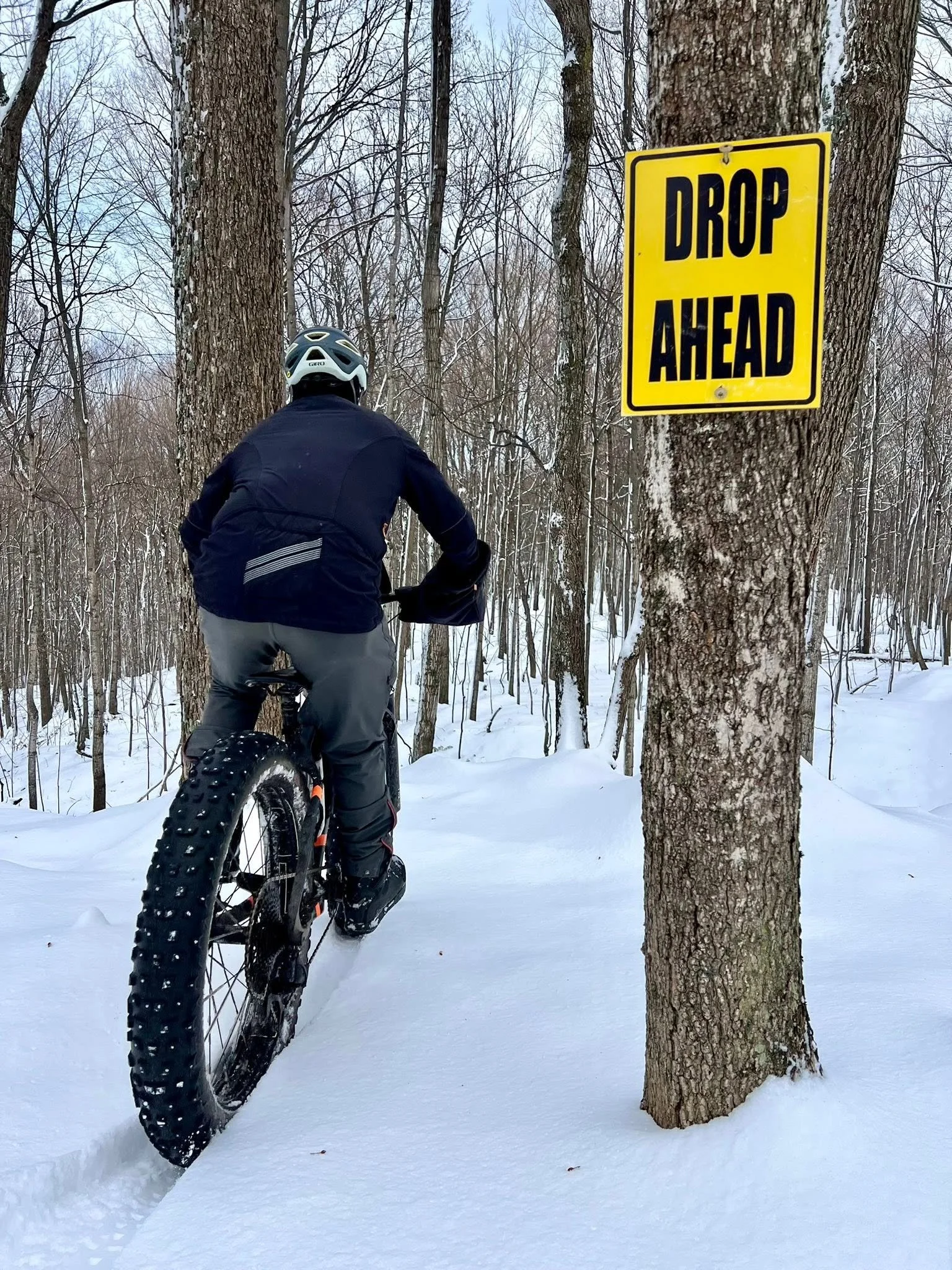 Fat biking on snowy trails near Rippling River Resort in Marquette, Michigan