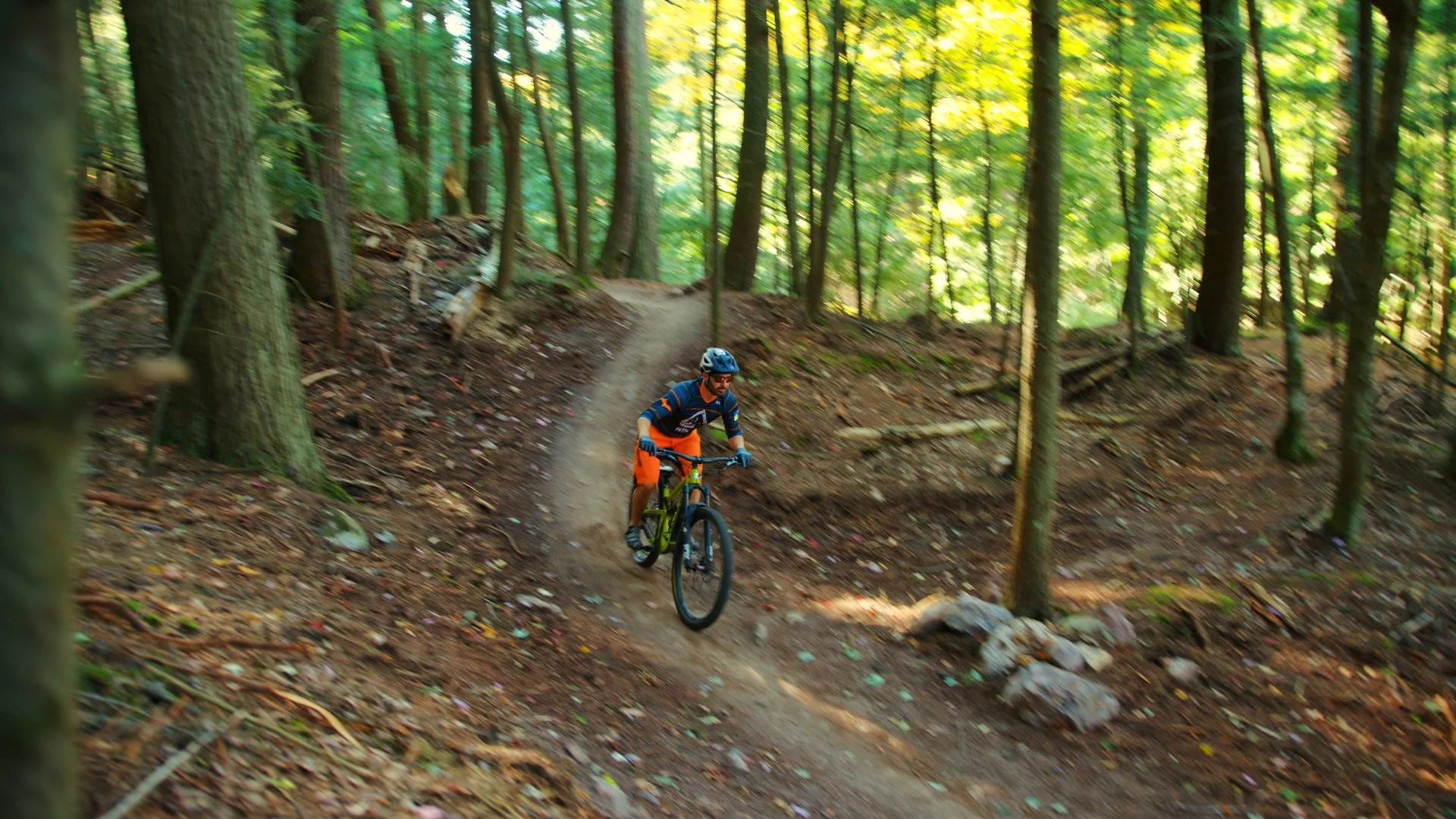 Man Mountain Biking through Upper Michigan Trails