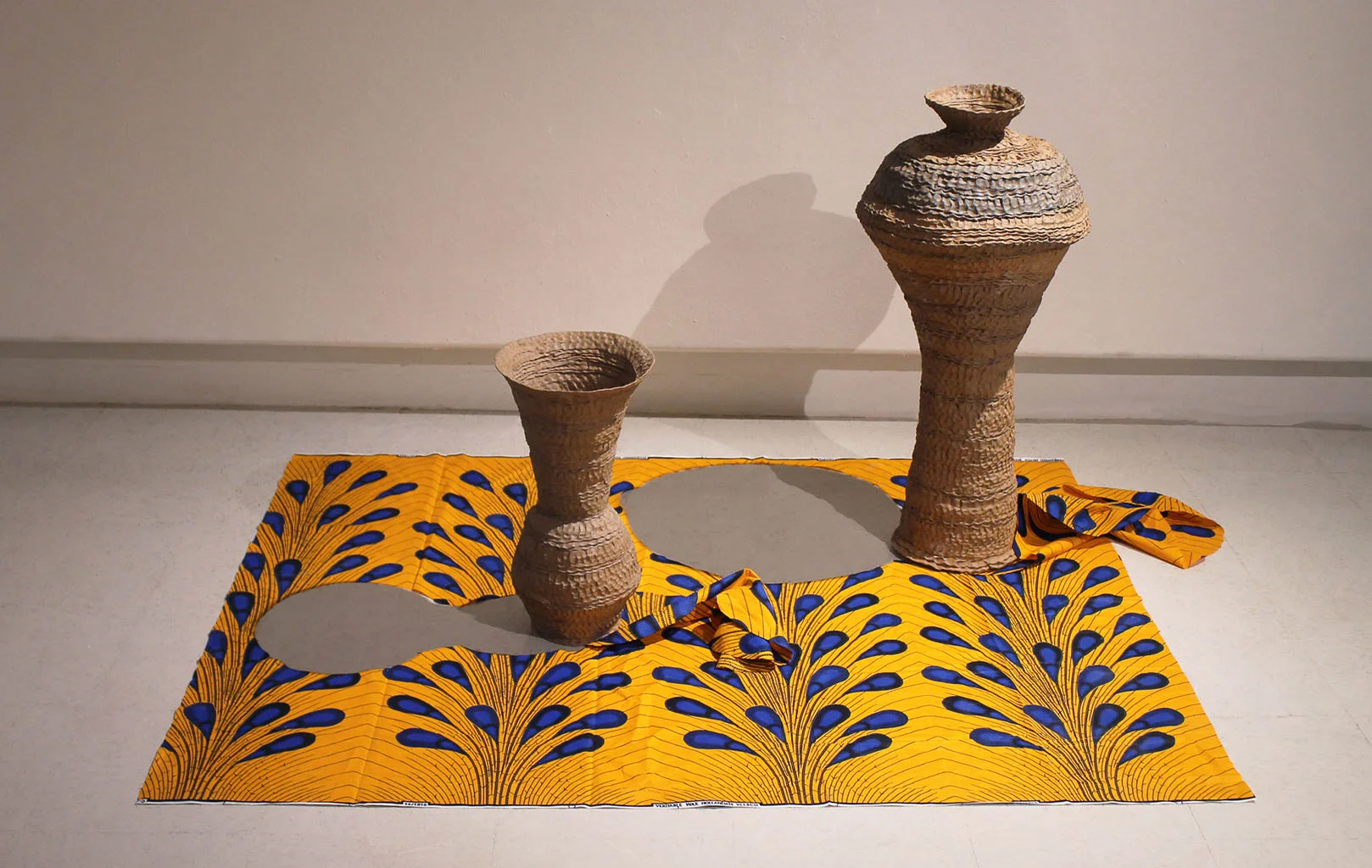    “   Dressmaker shadow”  2017 Terracotta, Ankara Fabric 