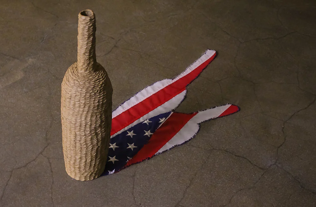   “Divided pride ” 2018 Stoneware, American flag, embroidery thread 