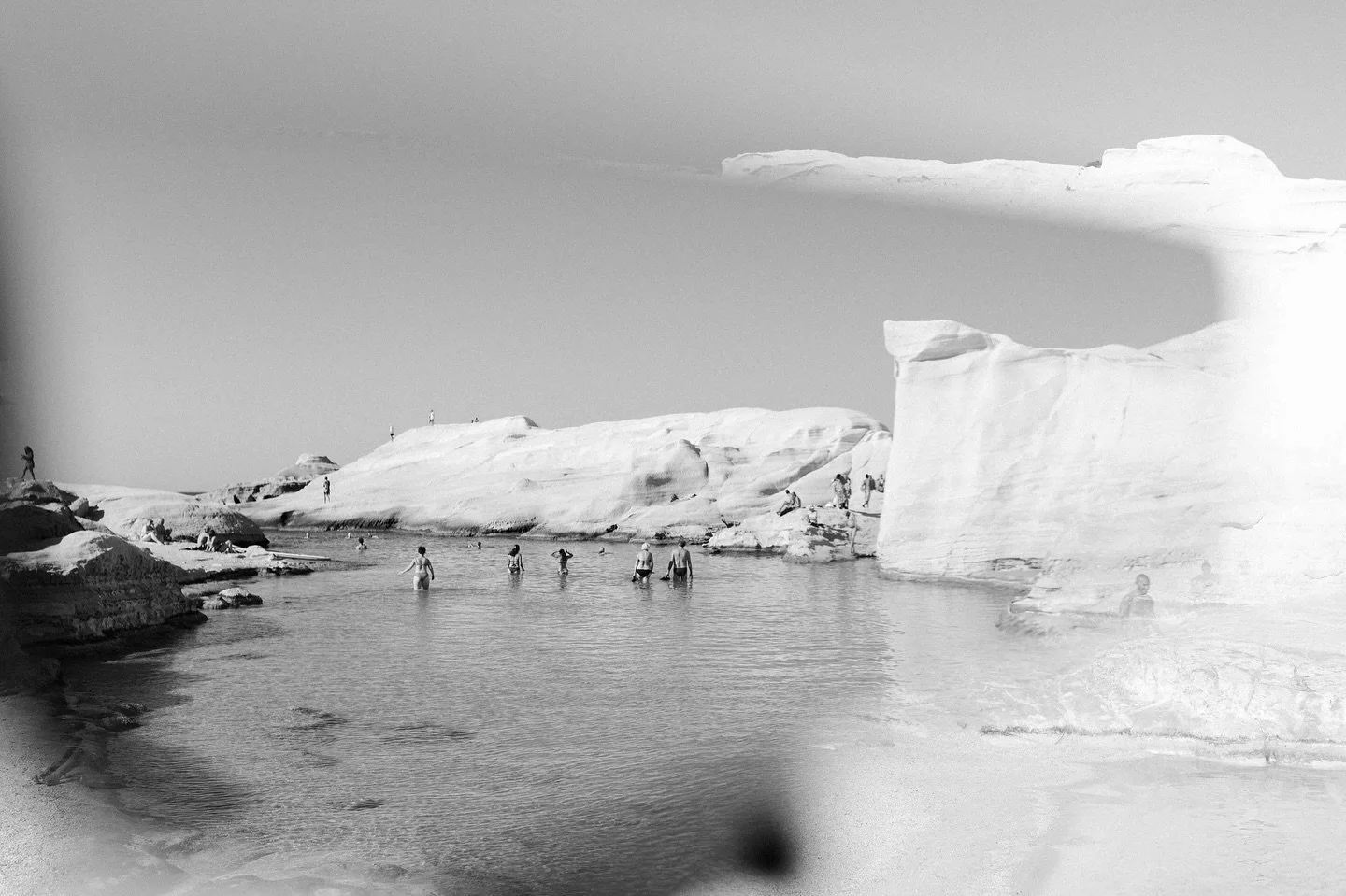 Using a handheld mirror to explore reflections&mdash;layering place, light, and perspective.