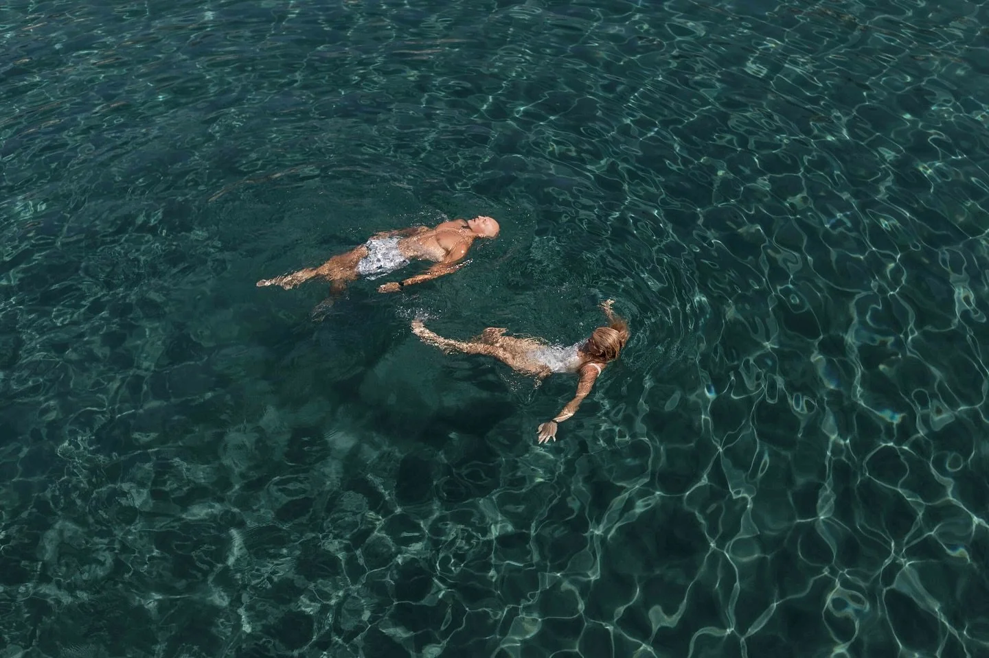 Hunter &amp; Emily surrounded by blue.