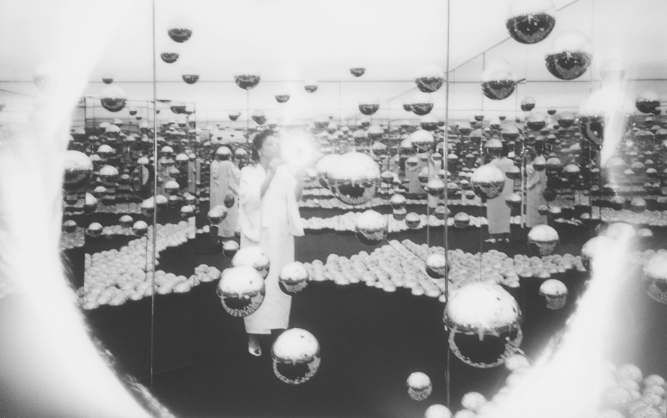 Self portrait in the infinity room
where reflection becomes repetition