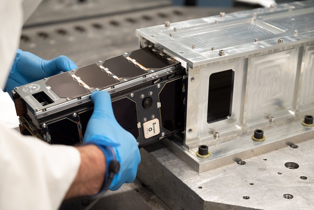ORCASat being loaded into the CubeSat deployer for the vibration test