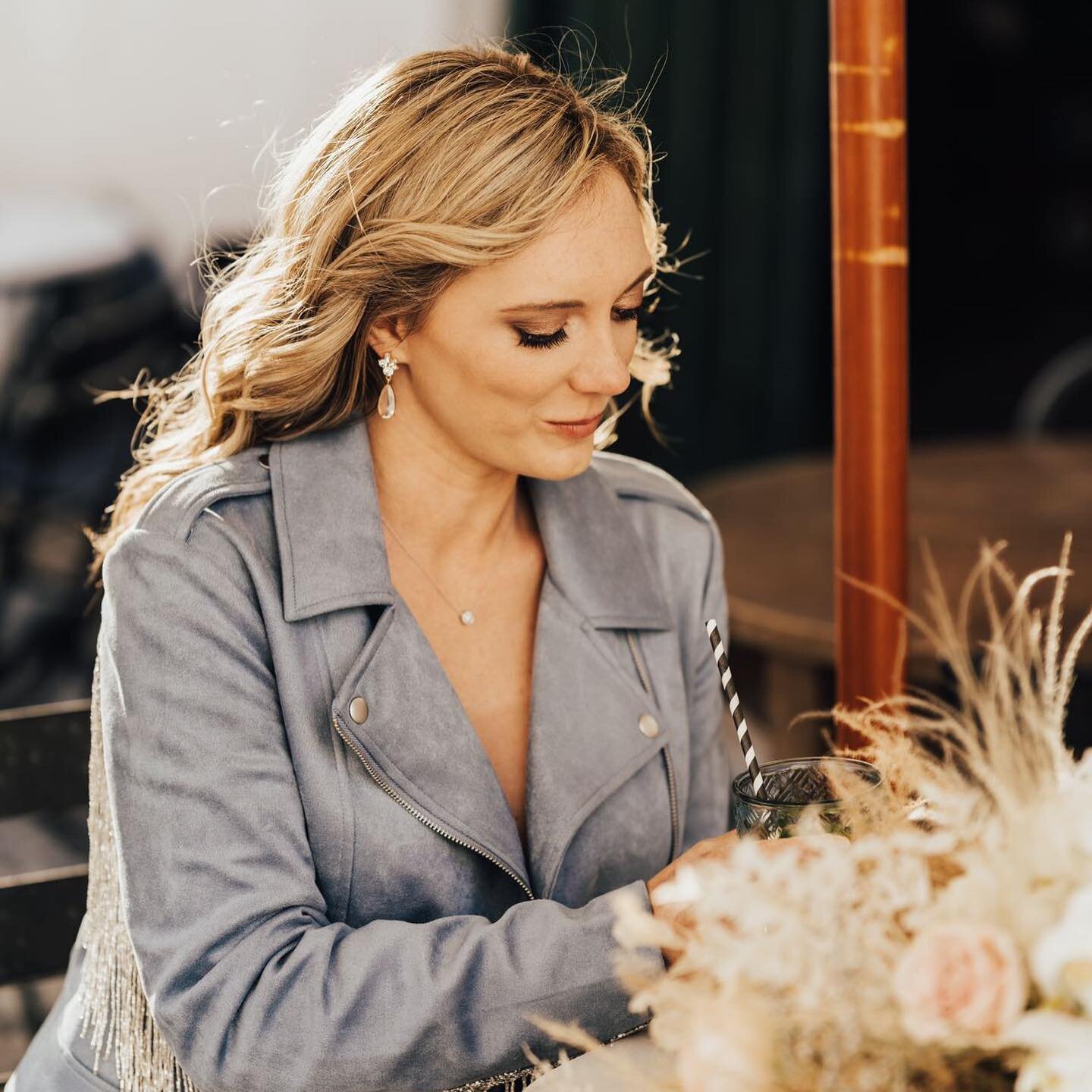 To new beginnings and adventures! 🥂 @whitney__lynne looking lovely on her wedding day💍💙featuring my blue leather &quot;Let the Adventure Begin&quot; jacket. ⁠
⁠
Visit the link in my bio or DM me for custom bridal jackets, disco balls, and gifts. P
