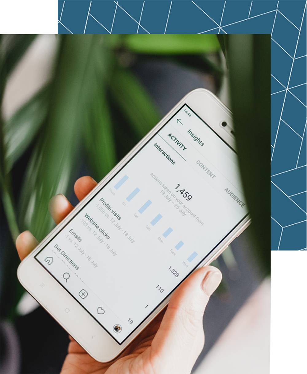 Mobile device with Instagram insights showing post engagement