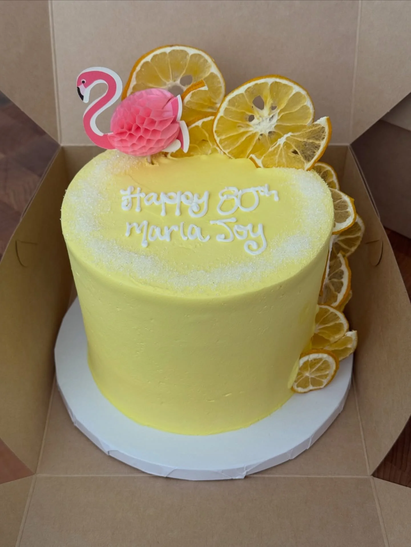 Marla Joy&rsquo;s 80th birthday cake with a nod to her favorite lemon drop martini 🍋 🍸 
.
.
.
.
.
#80 #lemondropmartini #flamingo #cake #buttercream