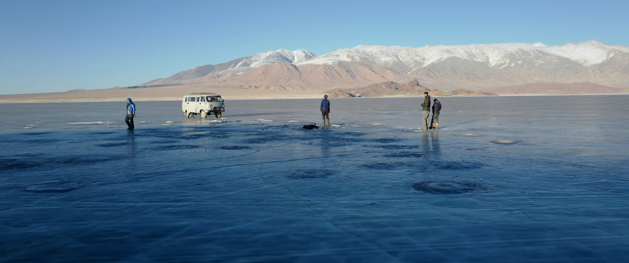 We heard about a frozen lake near Bayan Olgii in Mongolia, so we said, “Heck, yes! Let’s go fishing!”