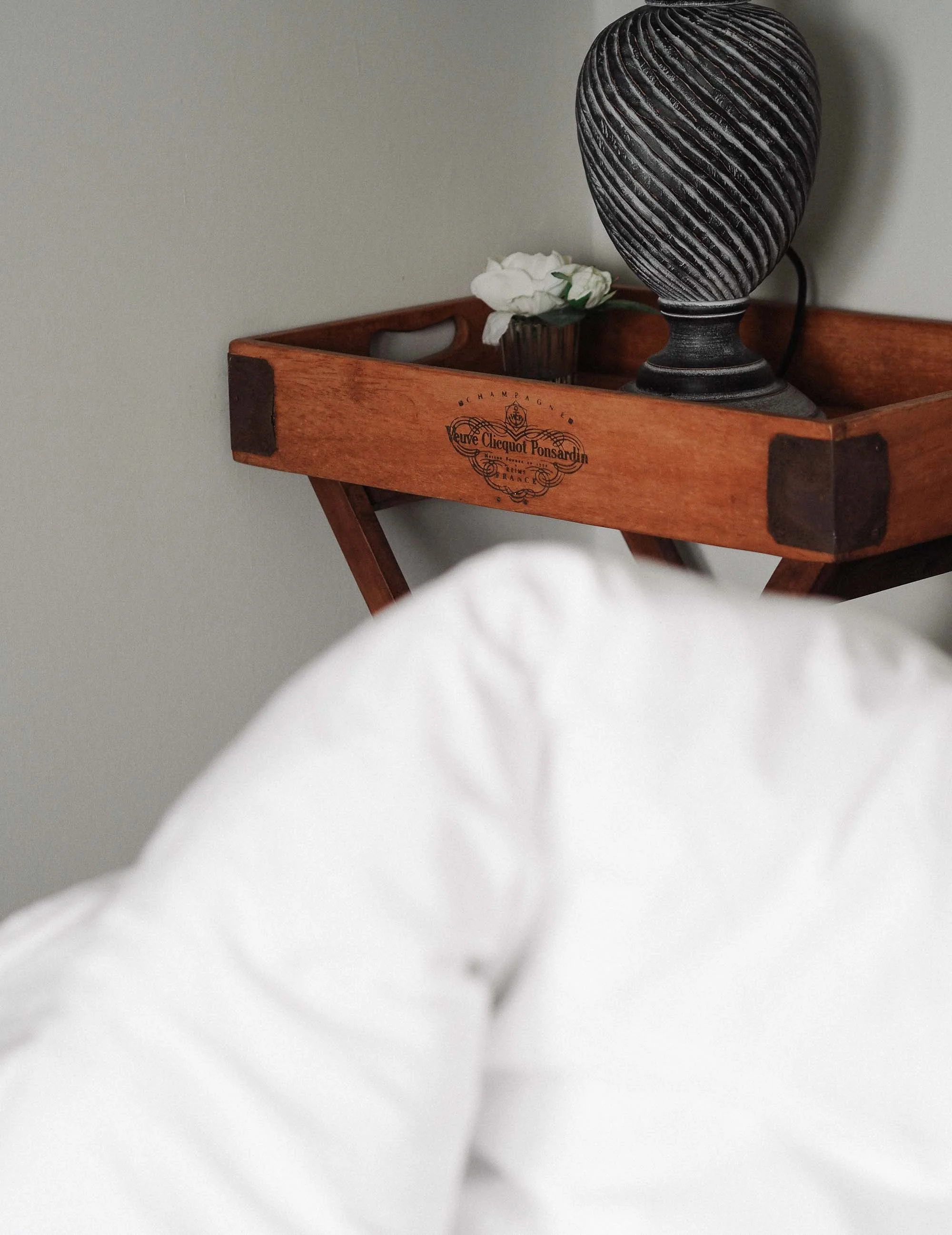 5 Veuve clicquot tray as nightstand.jpg