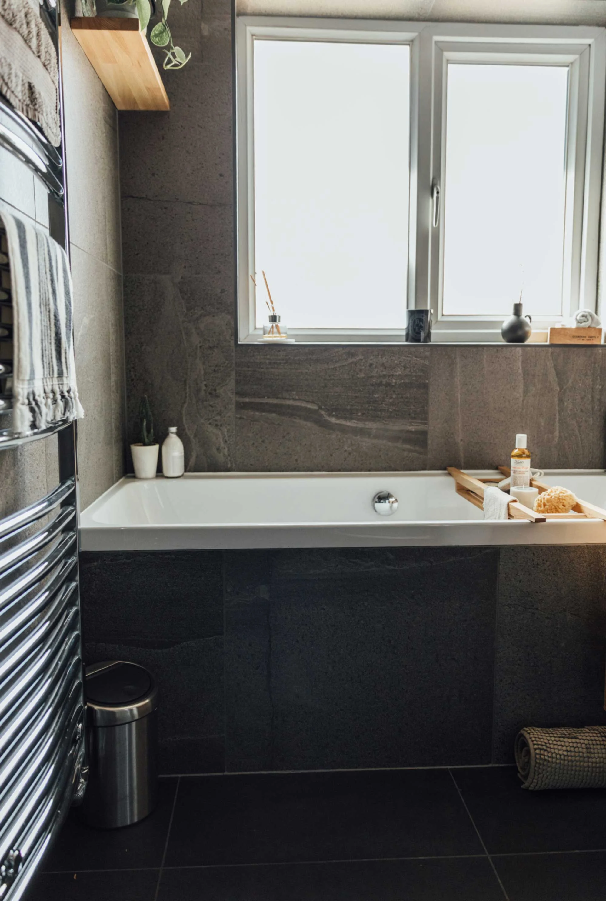 10 dark-tiled-bathroom-with-white-sanitaryware.jpg