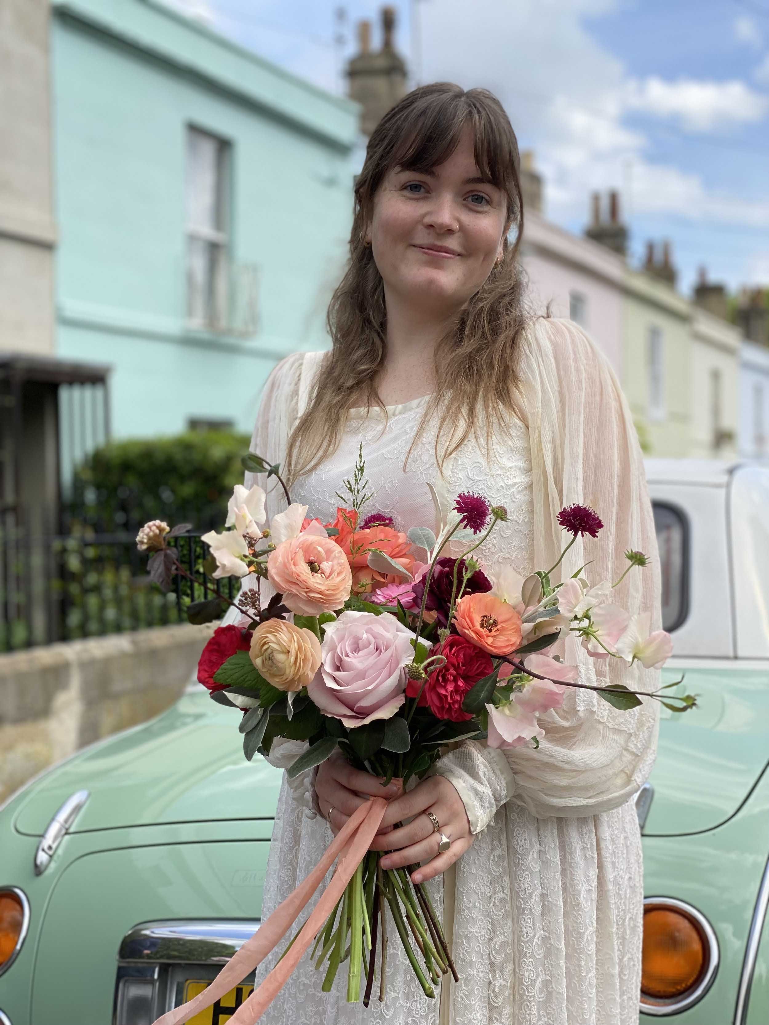 Seasonal bridal bouquet showcased by floristry student