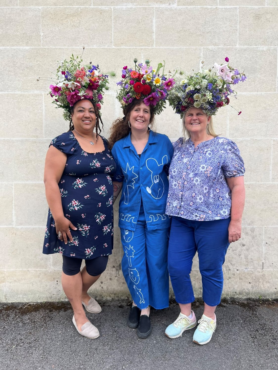 Happy Students showcasing their amazing British flower crowns 