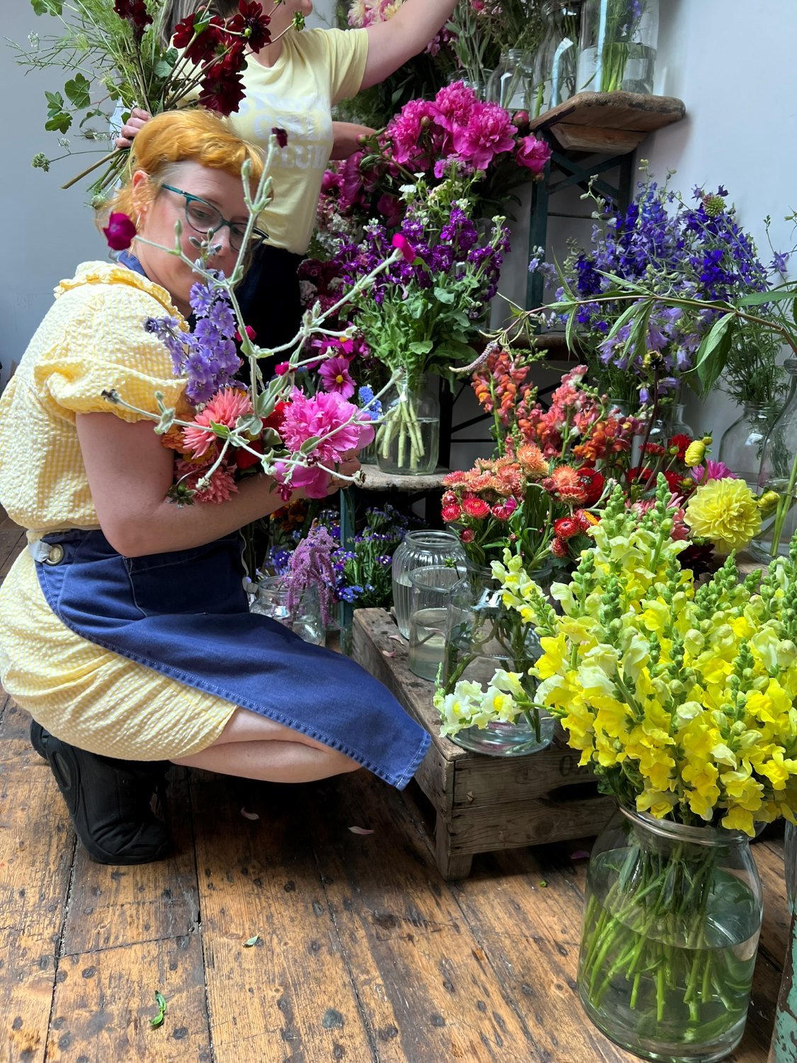 Student selecting British flowers at the school room