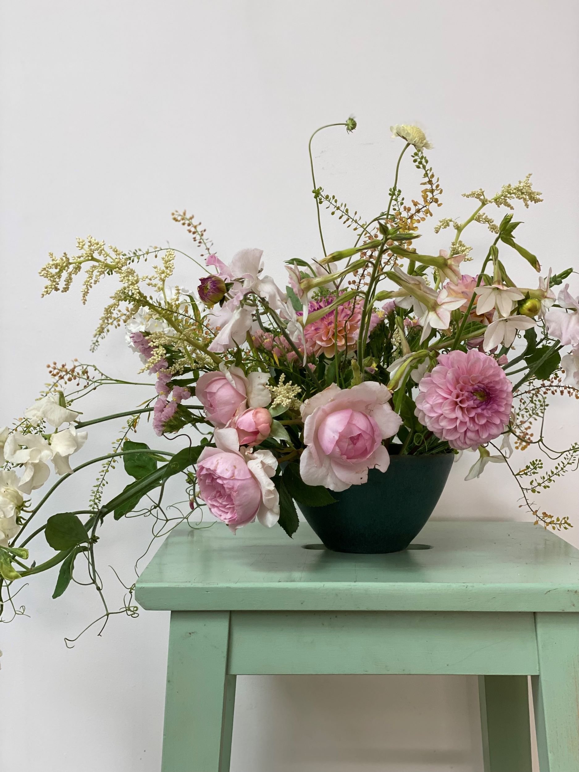 Garden inspired table arrangement of a pink British flowers colour palette 
