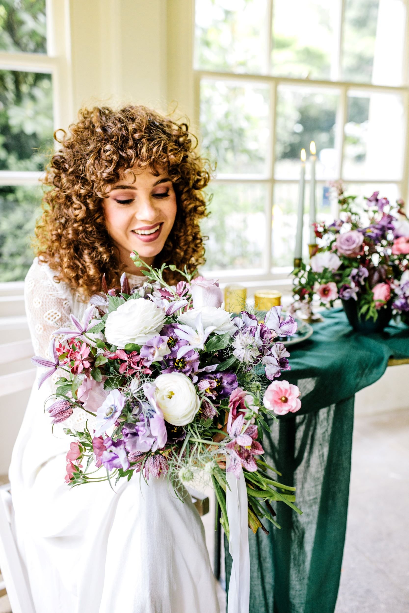 Bride with bouquet on the wedding flowers course