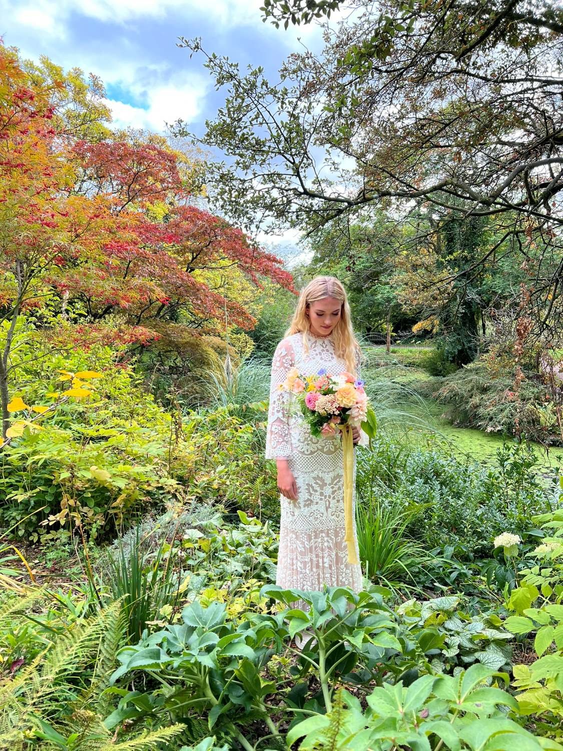 Wedding flowers photoshoot with bride at Bath's botanical gardens