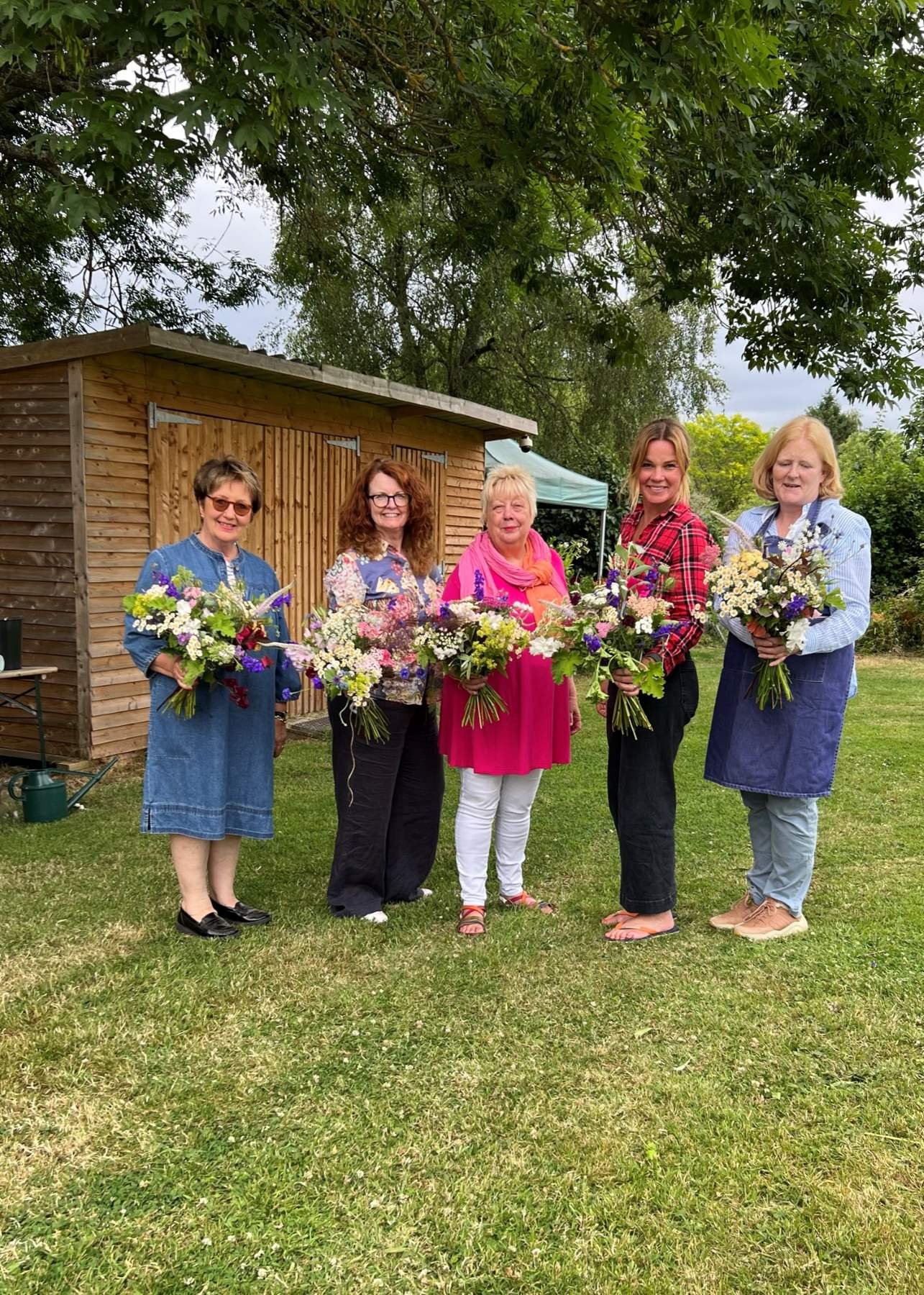 The Bath Flower School's student with their bouquets on the British flowers week one day course