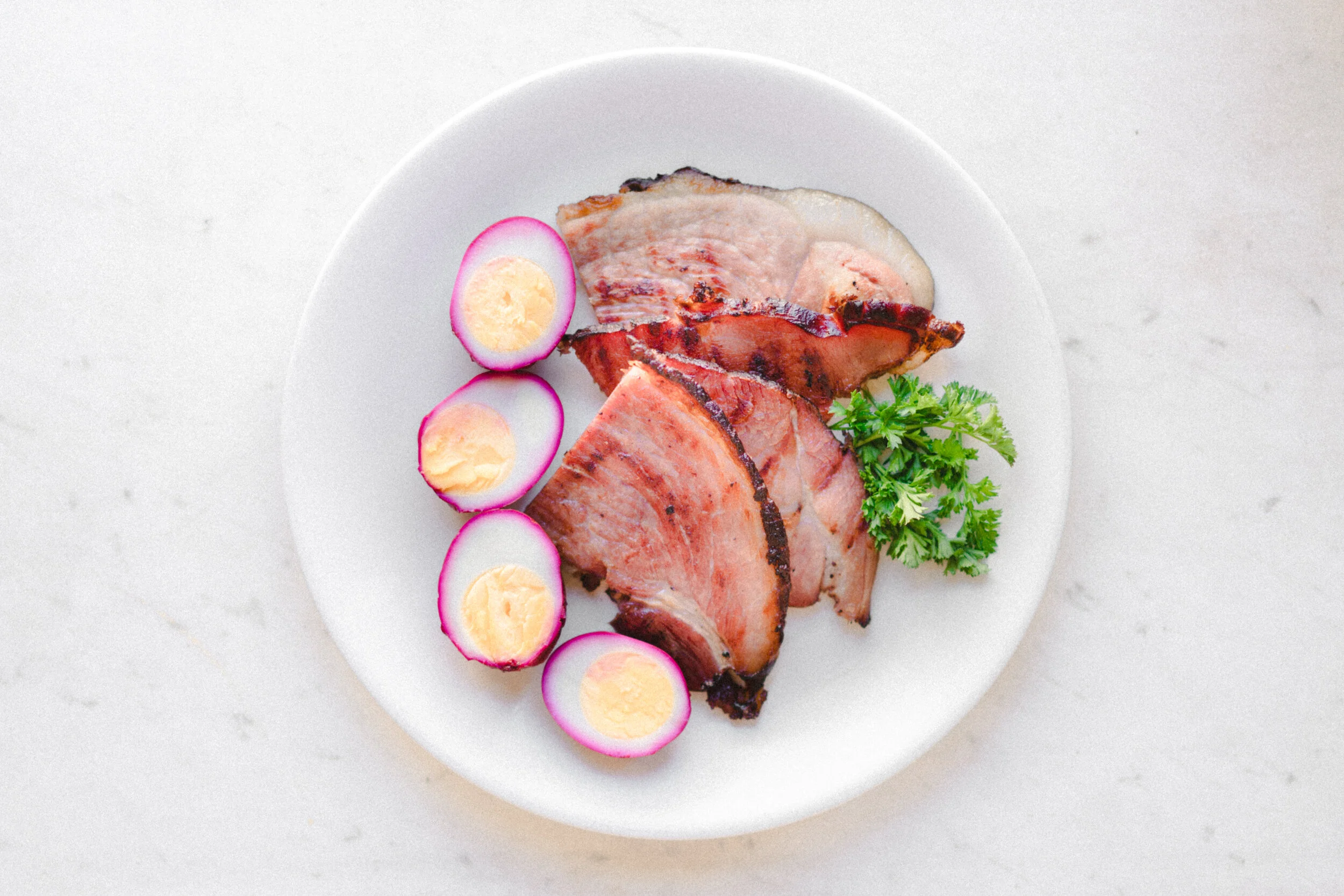 Artistic Shot of Slices of Smoked Ham on a Plate